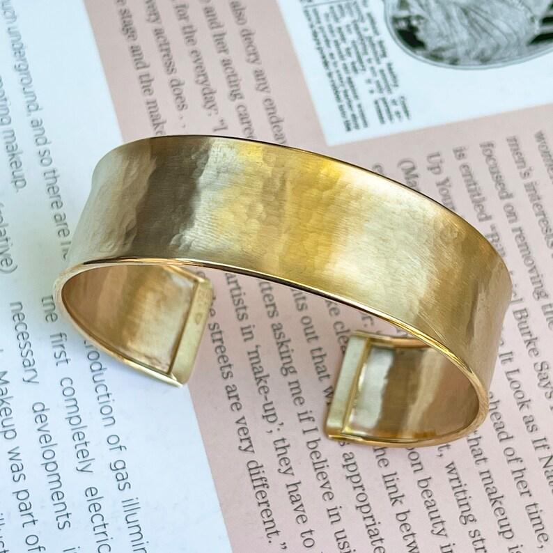 Metal Purity: 14k Stamped
Country of Origin: Italy
Metal Weight: 16.5 grams
Measurement: 19mm wide - Adjustable
Certificate of Authenticity

The Italian Solid 14k Yellow Gold Cuff Bangle Bracelet is a beautiful and unique piece of jewelry that is