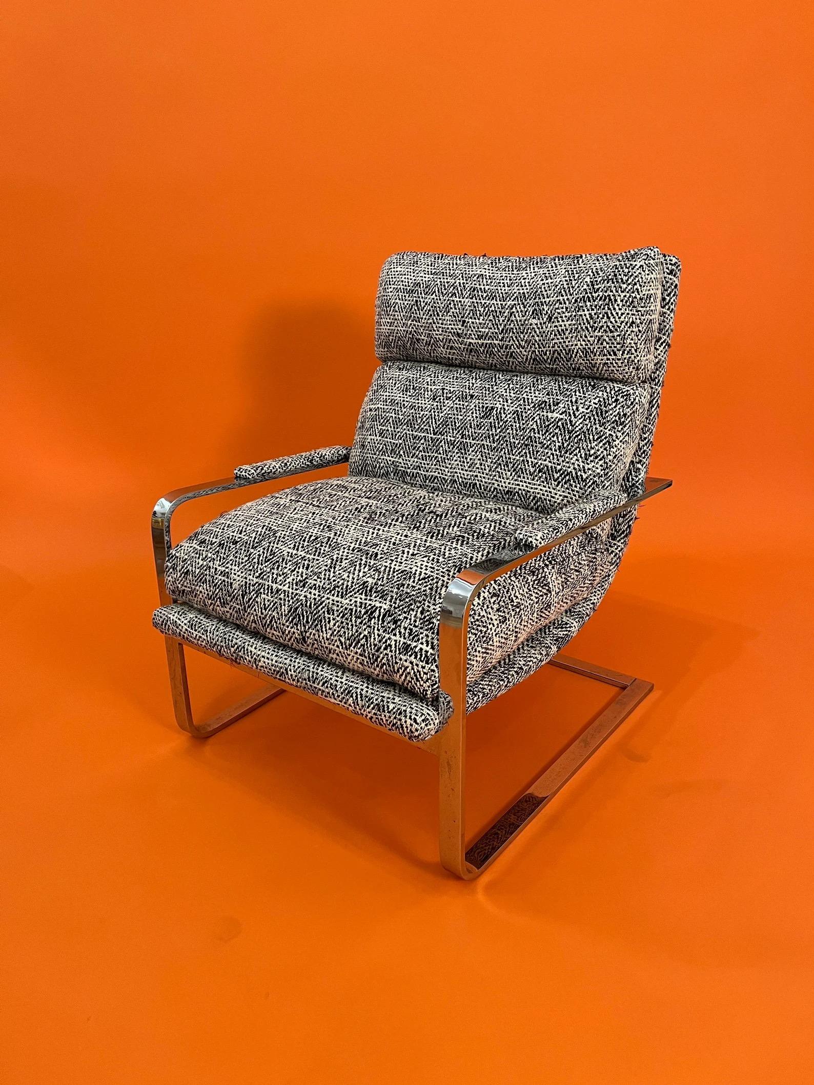 Curated, midcentury Heavy chrome lounge chair with new black & White tweeted Upholstery 1960s. Milo Baughman style 1970s circa 

Dimensions: 
Arm to Arm: 26 inches 
Interior deep: 19 inches
High-back: 33 inches 
Exterior Depth: 27 inches
Seat