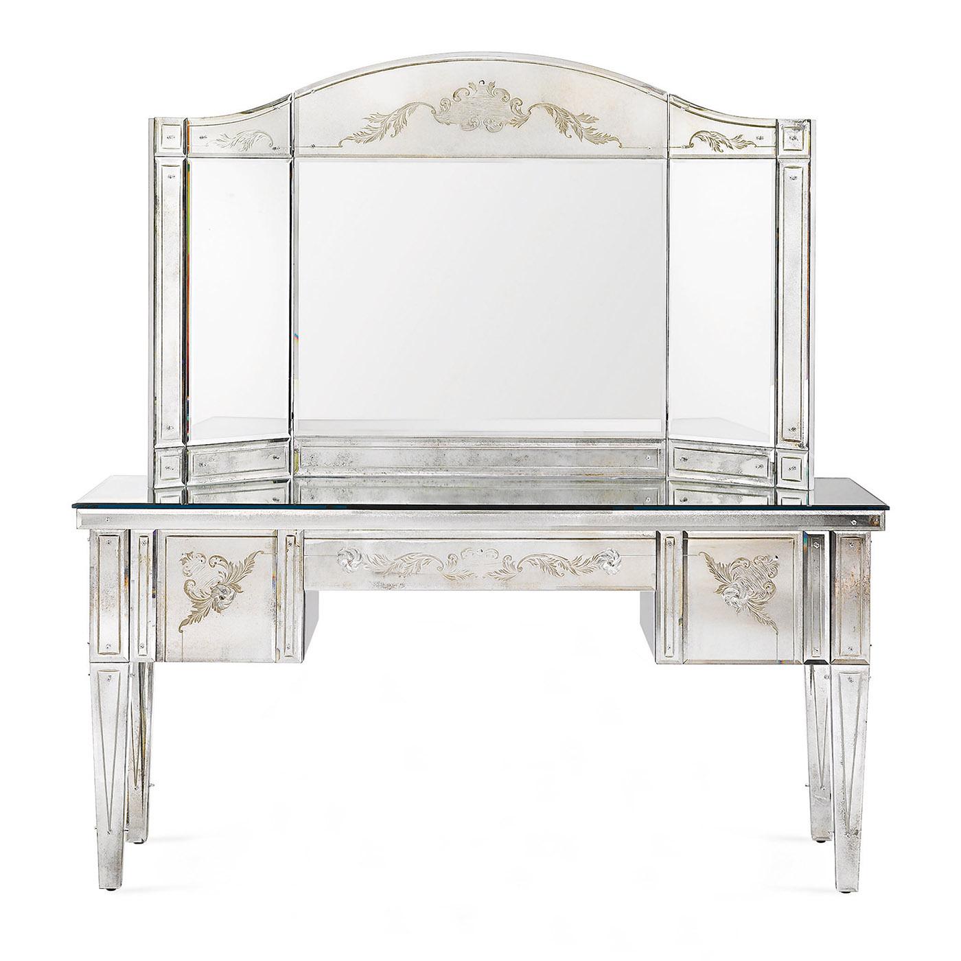 This French-style make-up desk belongs to the Montrmarte Collection. The Art Déco style suits perfectly any design scheme for royal bedrooms. The structure is made of wood with silver leafed finish. Four tapered legs with chrome-plated metal lower