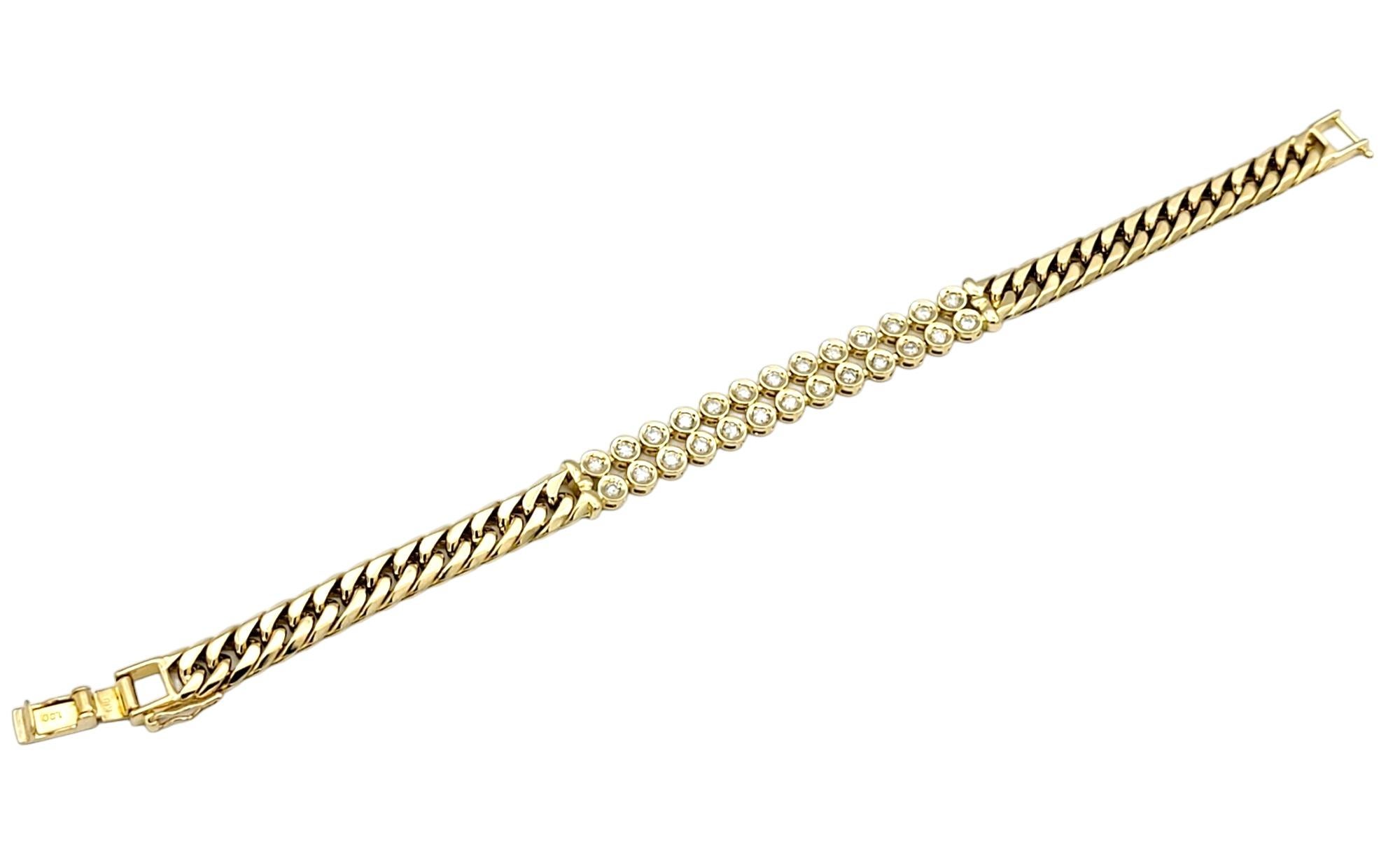 Contemporary Curb Link Bracelet with Bezel Set Round Diamonds Set in 18 Karat Yellow Gold For Sale
