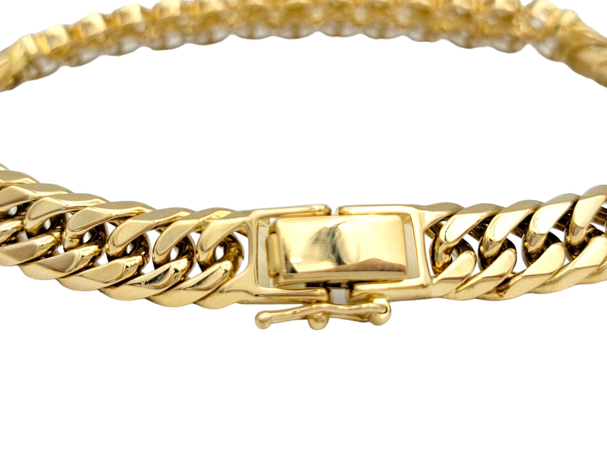 Curb Link Bracelet with Bezel Set Round Diamonds Set in 18 Karat Yellow Gold In Good Condition For Sale In Scottsdale, AZ