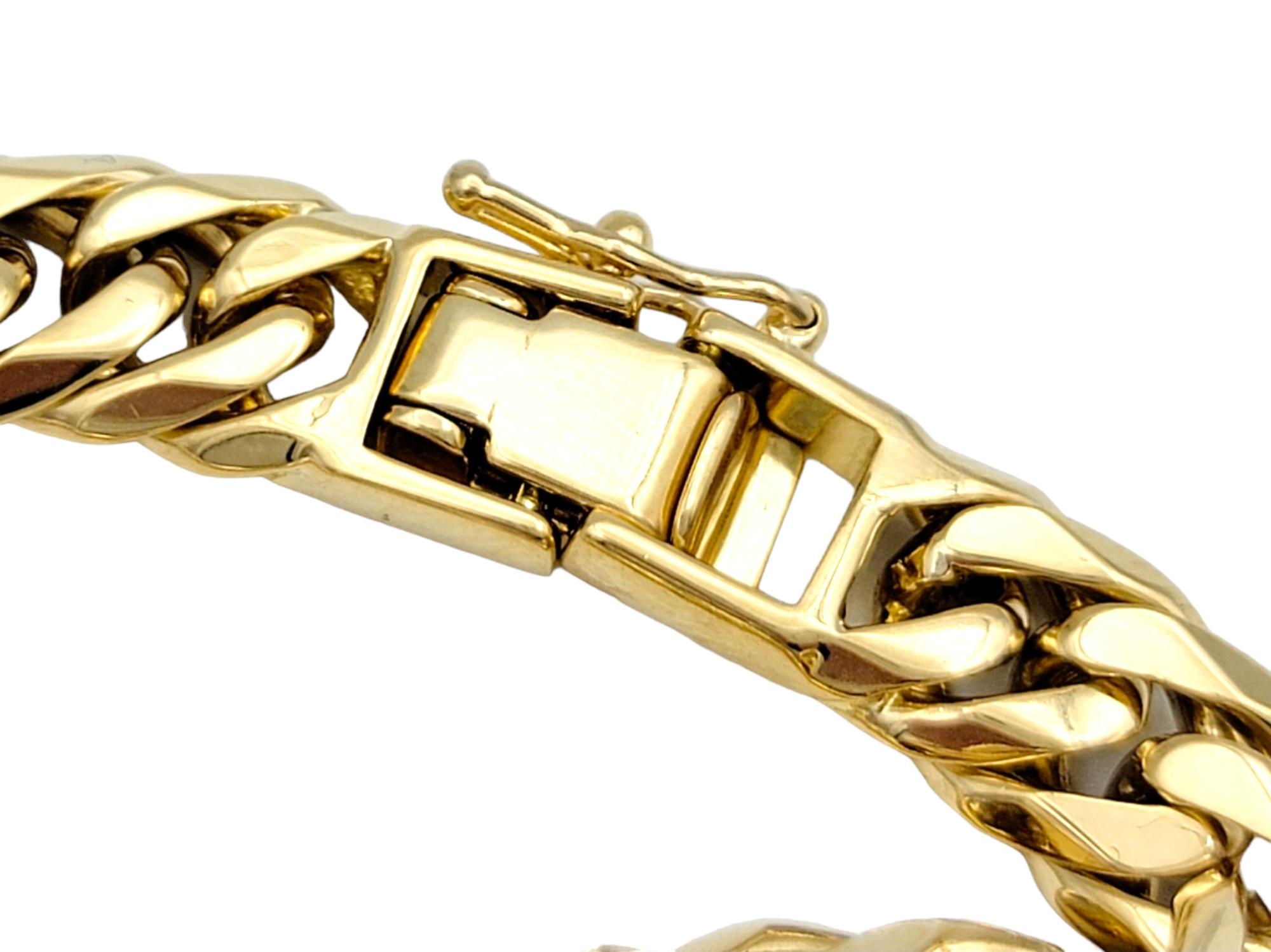 Women's Curb Link Bracelet with Bezel Set Round Diamonds Set in 18 Karat Yellow Gold For Sale