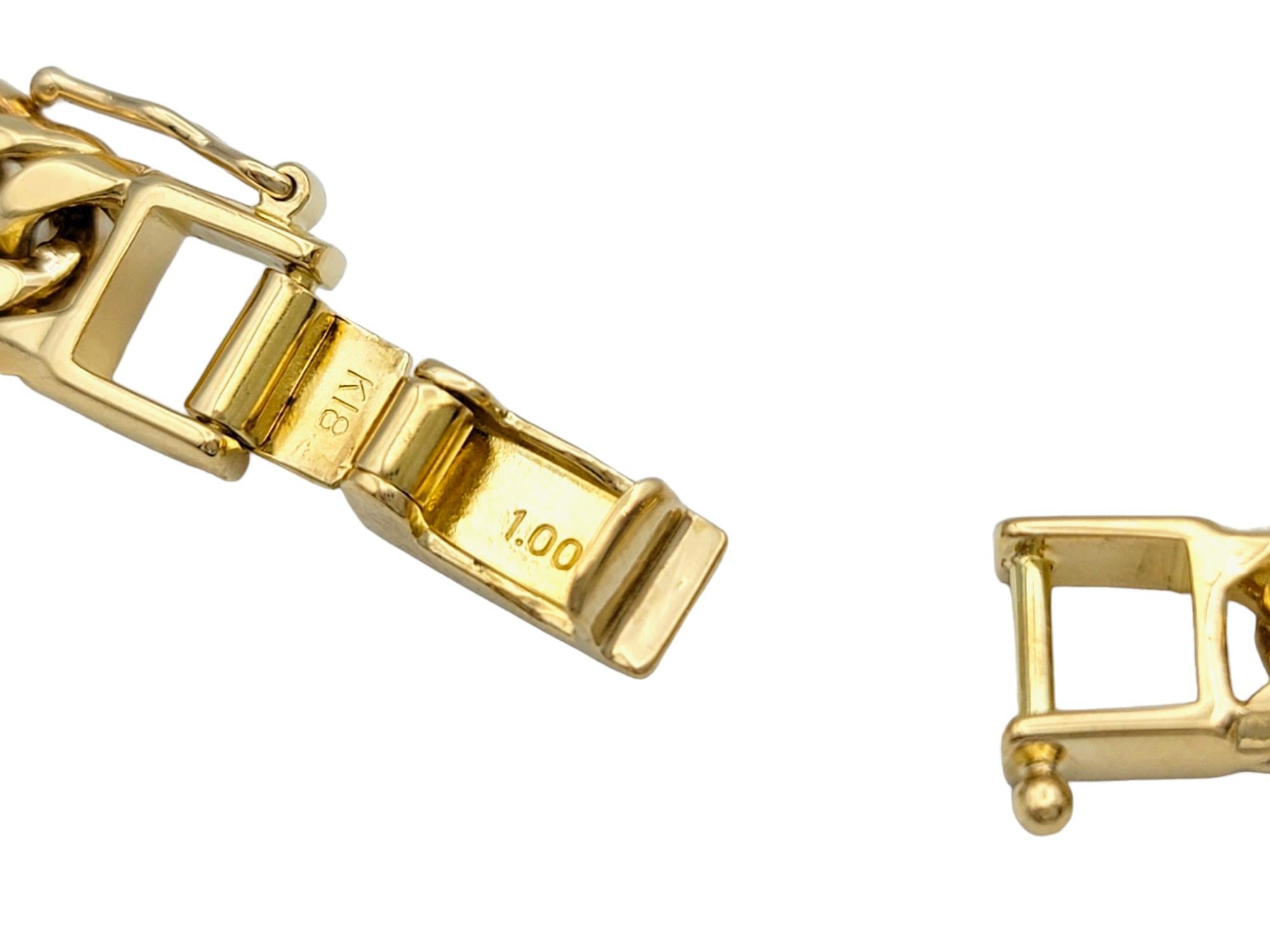 Curb Link Bracelet with Bezel Set Round Diamonds Set in 18 Karat Yellow Gold For Sale 1