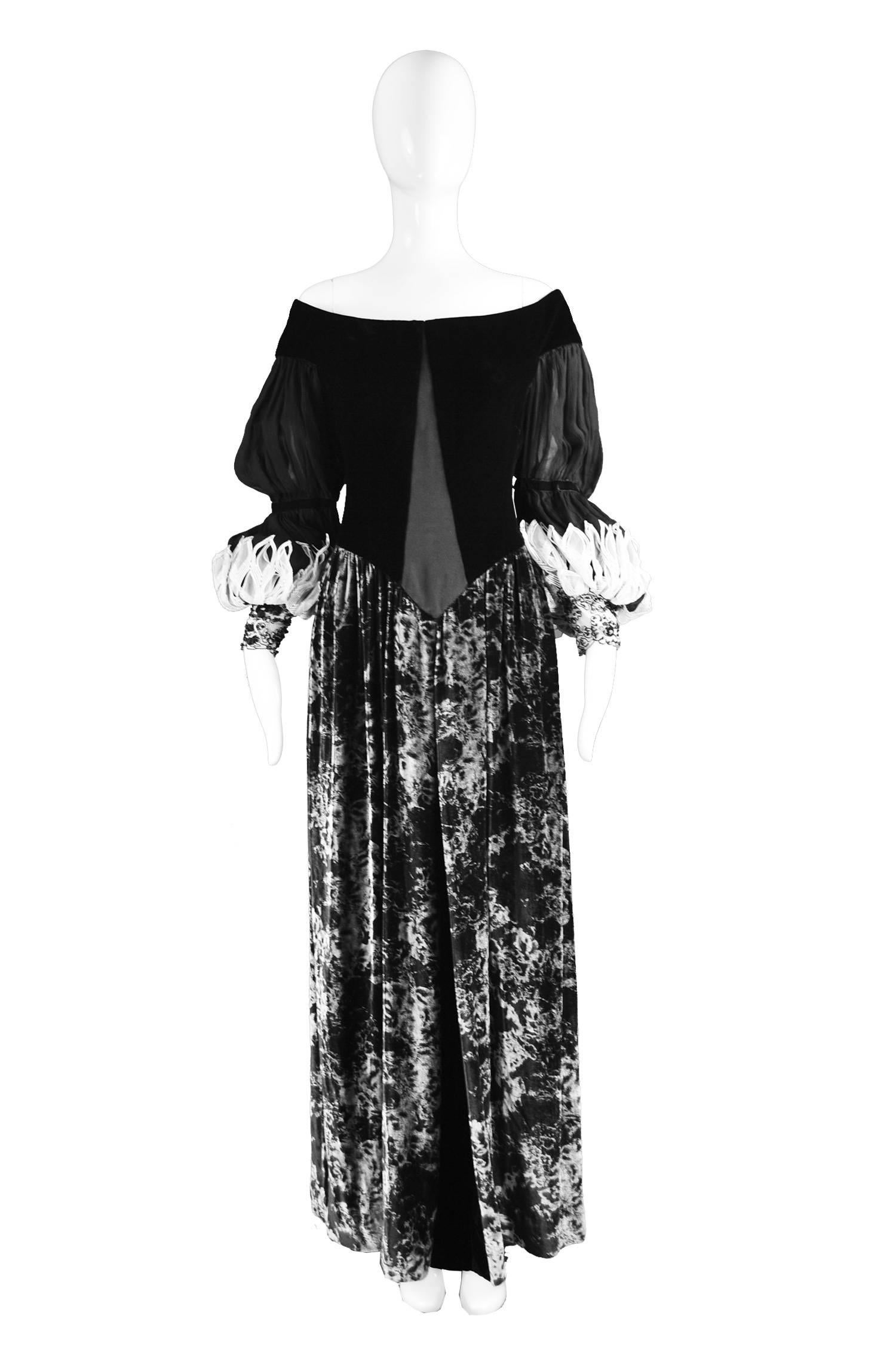 Curiel Couture Vintage Black & Grey Printed Velvet & Chiffon Evening Gown, 1970s

Estimated Size: UK 12/ US 8/ EU 40. Please check measurements.
Bust - 36” / 91cm
Waist - 30” / 76cm
Hips - Free
Length (Shoulder to Hem) - 56” / 142cm

Condition: