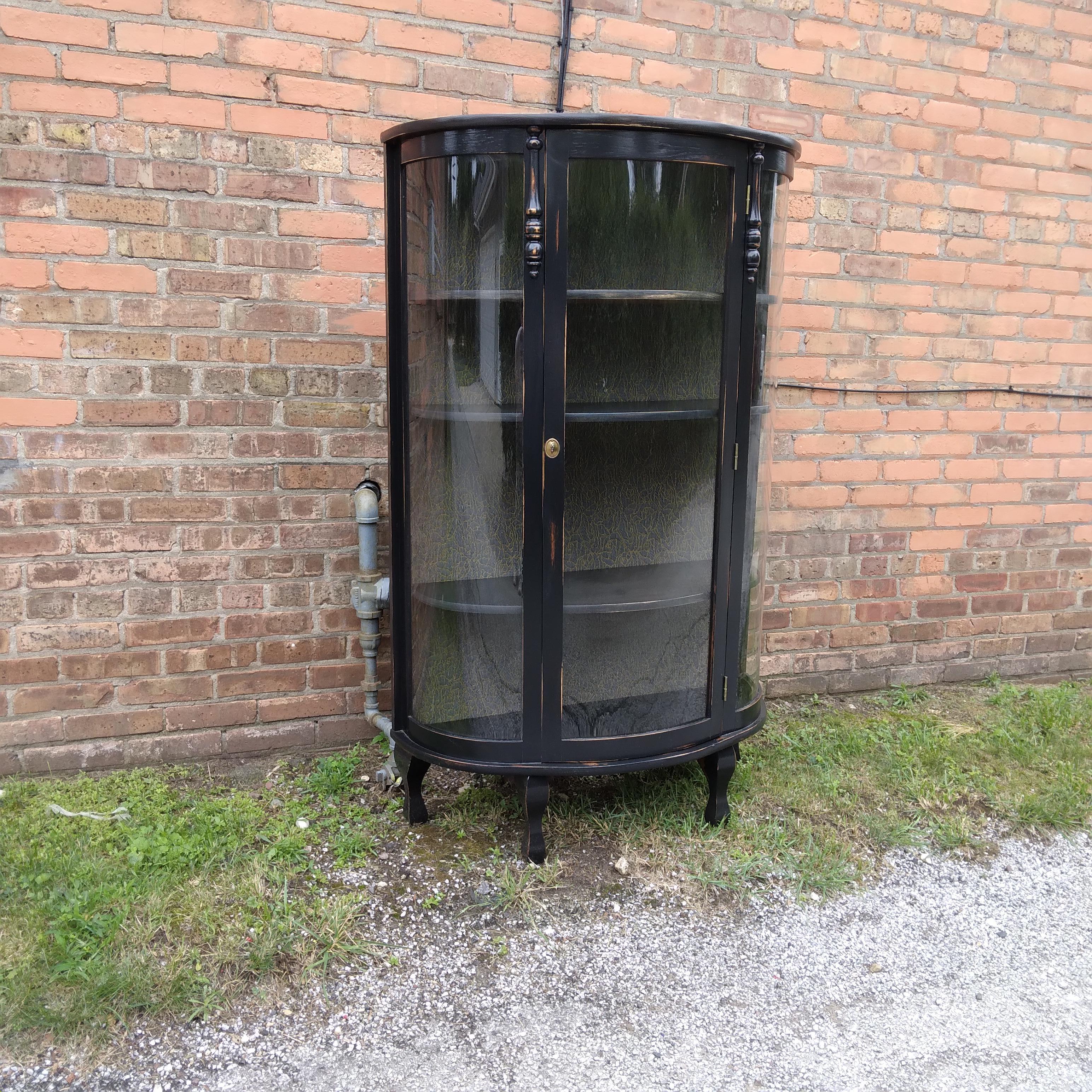 Curio Display Cabinet with Curved Glass and Black Wooden Frame In Good Condition In Munster, IN