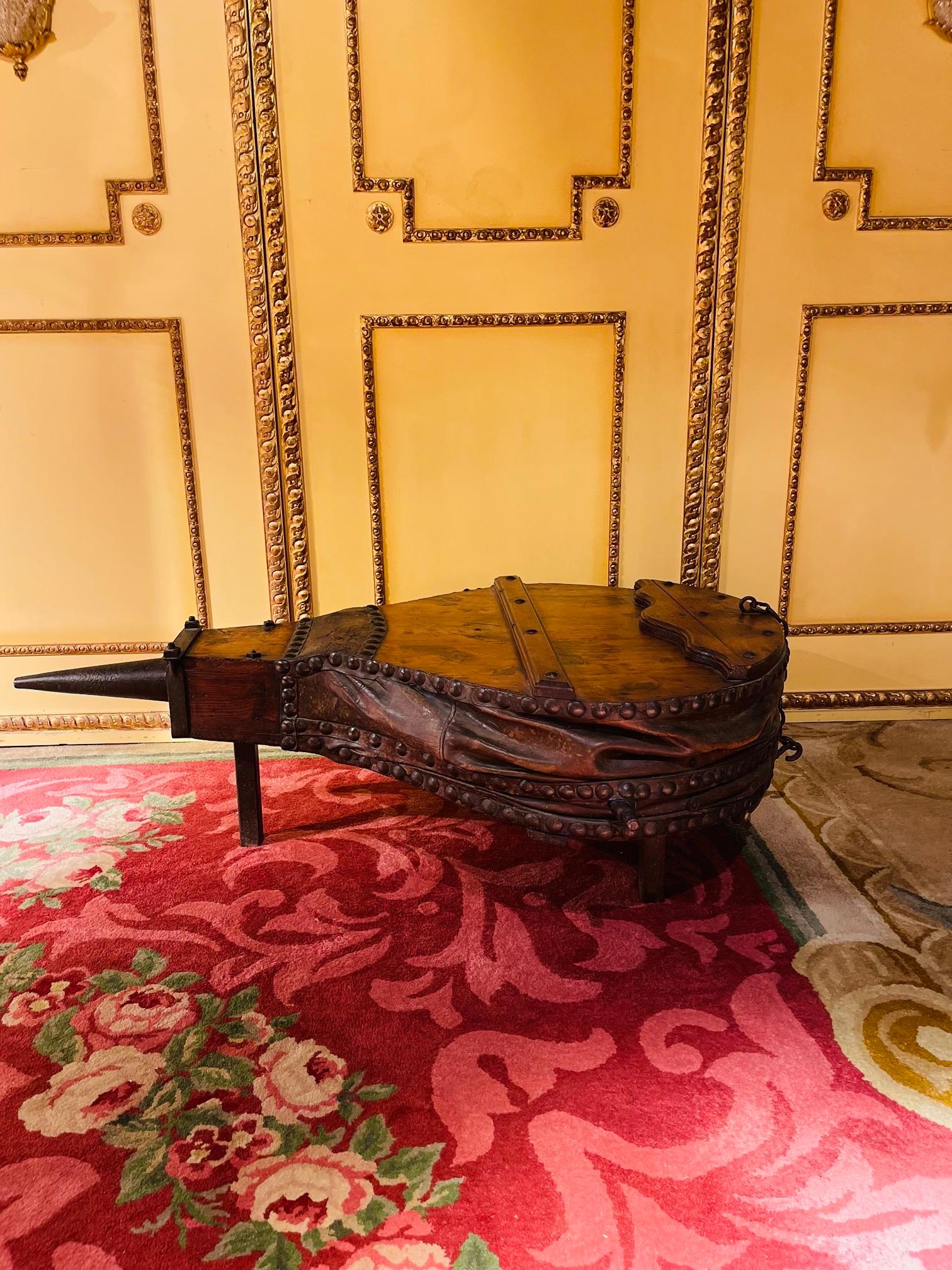 Curious antique industrial bellows as a coffee table, around 1880

Unique, curious bellows converted into a coffee table made of solid wood, cast iron and leather.
Very high quality processed
Anyone who loves the curious and extravagant