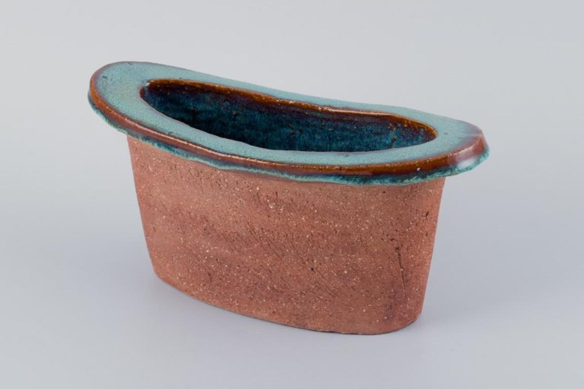 Glazed Curt Addin, large bowl in chamotte clay. Interior with turquoise glaze. For Sale