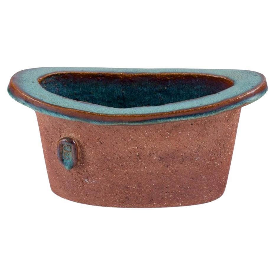 Curt Addin, large bowl in chamotte clay. Interior with turquoise glaze. For Sale