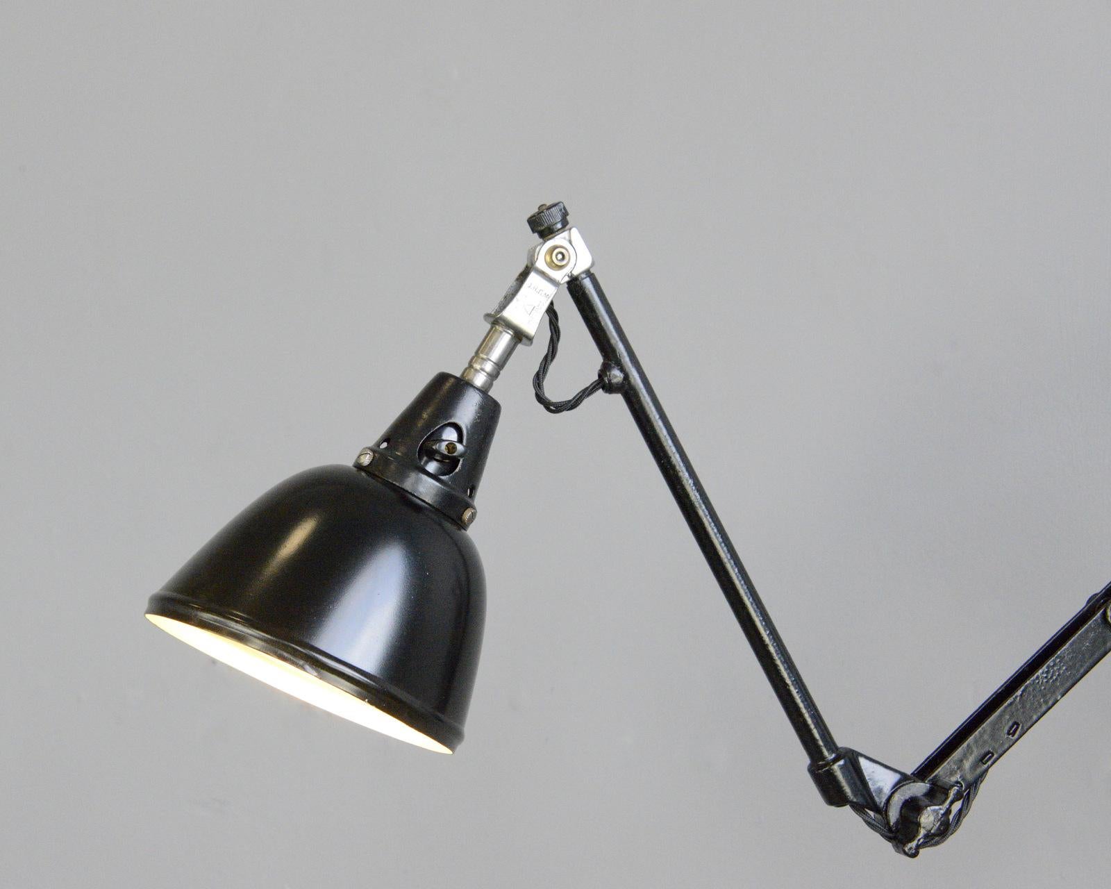 Curt Fischer Midgard scissor lamp, circa 1930s

- Extendable scissor mechanism
- Aluminium shade
- Takes E27 fitting bulbs
- On/Off Switch on the cable
- Designed by Curt Fischer
- Produced by Midgard, Auma
- German ~ 1930s
- Measures: 16cm