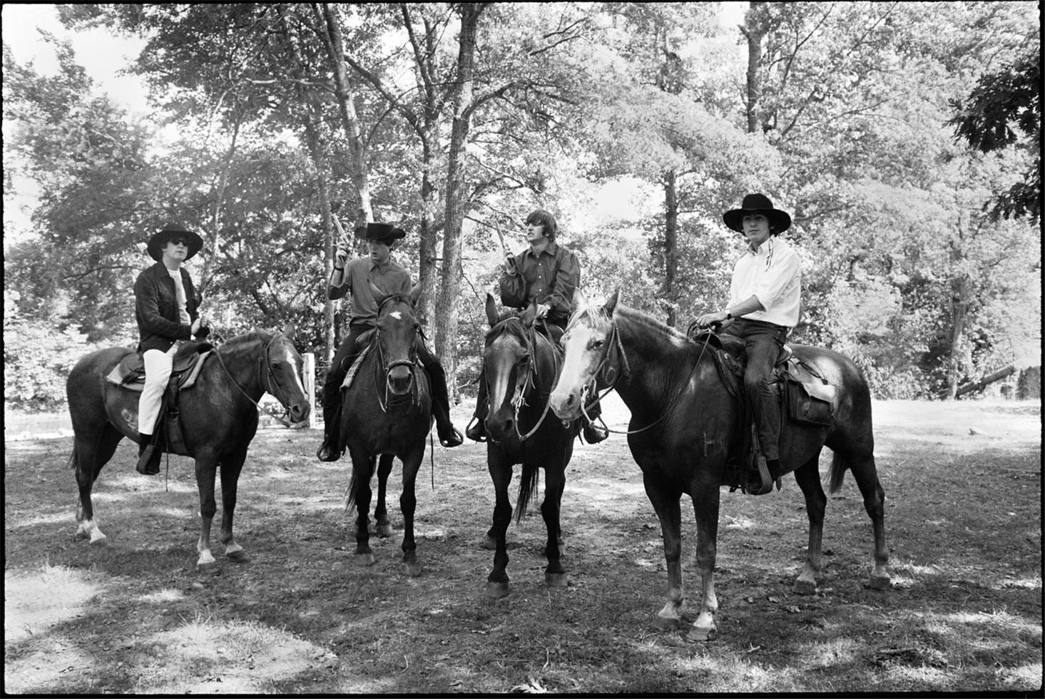 Curt Gunther Black and White Photograph - Beatles On Horses