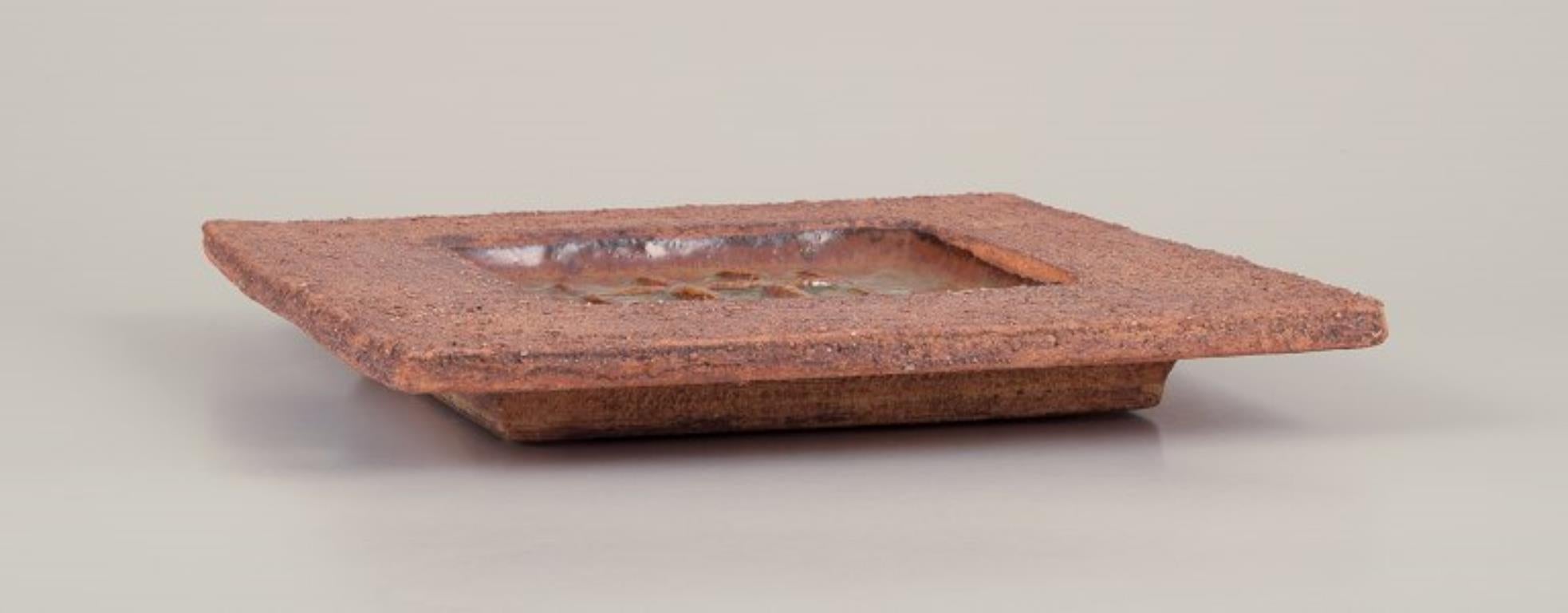 Late 20th Century Curt Magnus Addin, Swedish ceramist. Own studio. Square ceramic dish. For Sale
