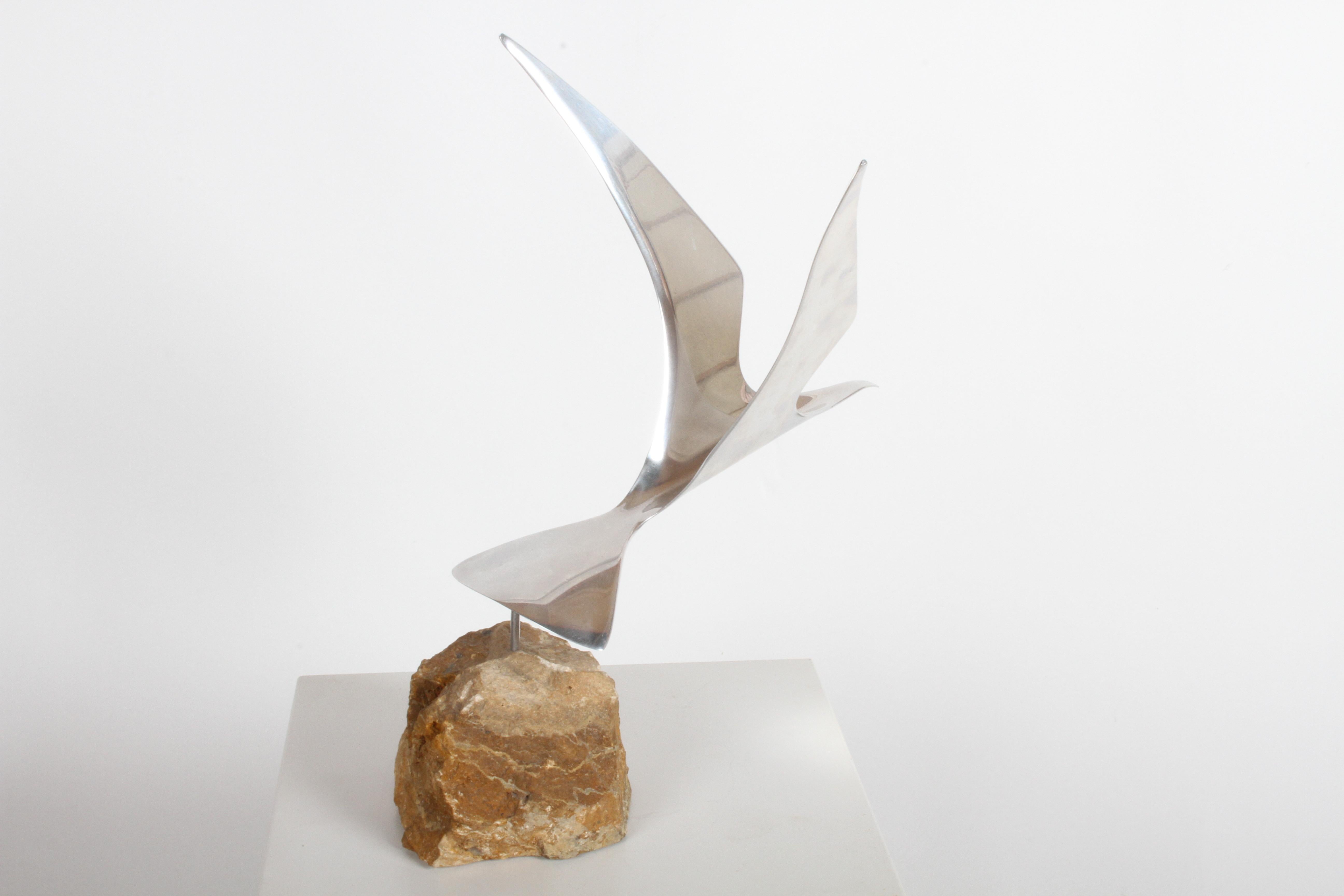 Curtis Jere aluminum flying seagull table sculpture on quartz rock base, signed on lower right tail C. Jere, 1980. Signature is scratched into aluminum, hard to photograph. Very nice original condition.