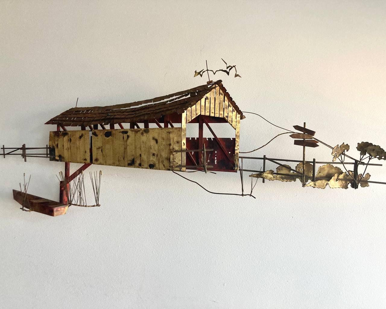 CURTIS JERE Signed Mid Century Wall Sculpture House Country Barn Bridge with Row Boat and Scenery. 

This wall sculpture by Curtis Jere is made of handcrafted brass, metal and copper.

 This wall sculpture depicts a covered bridge, fence and foliage