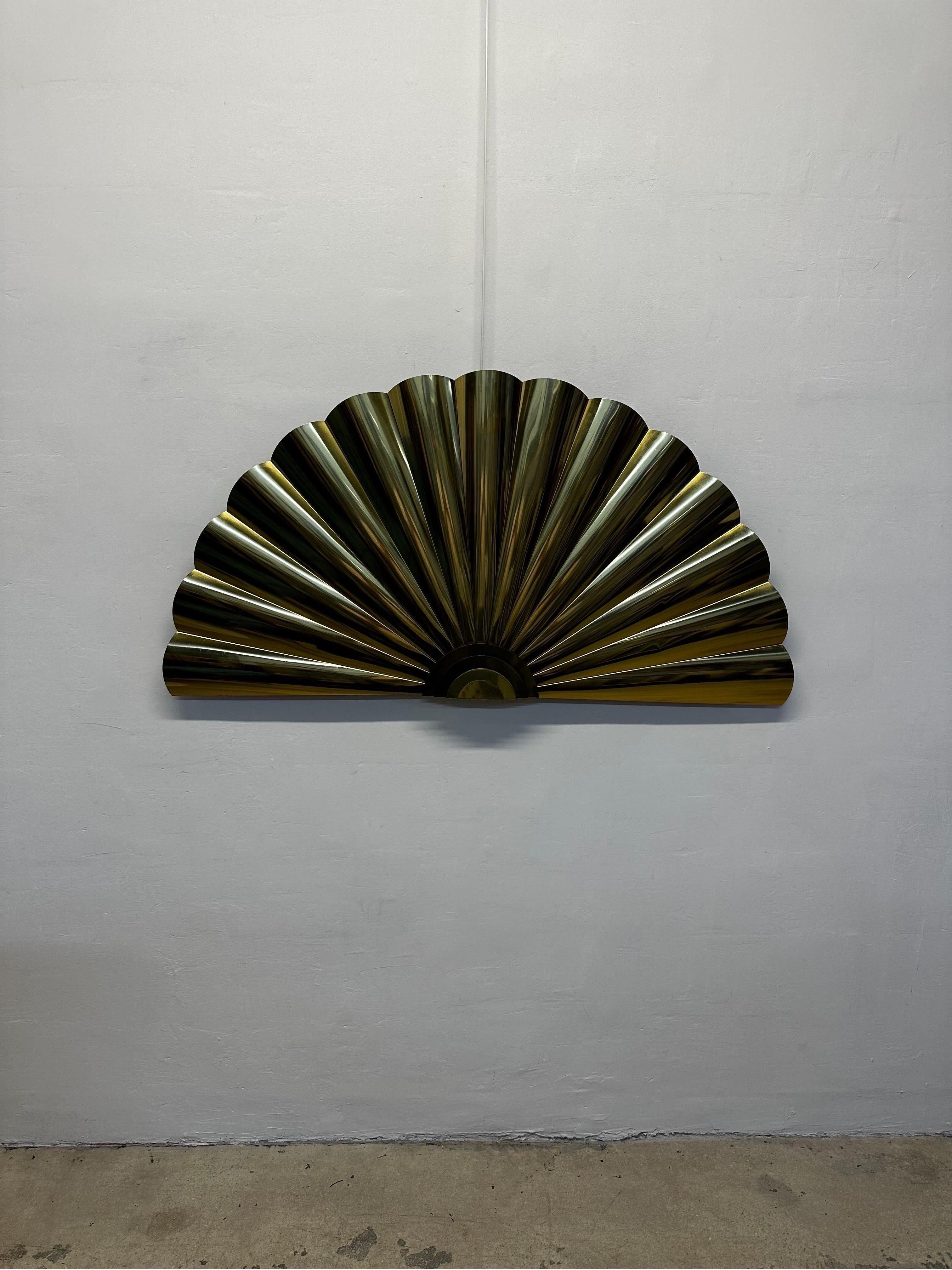 Large brass wall sculpture in the form of a fan or shell by C. Jere Artisan House.  Signed and dates 1989.