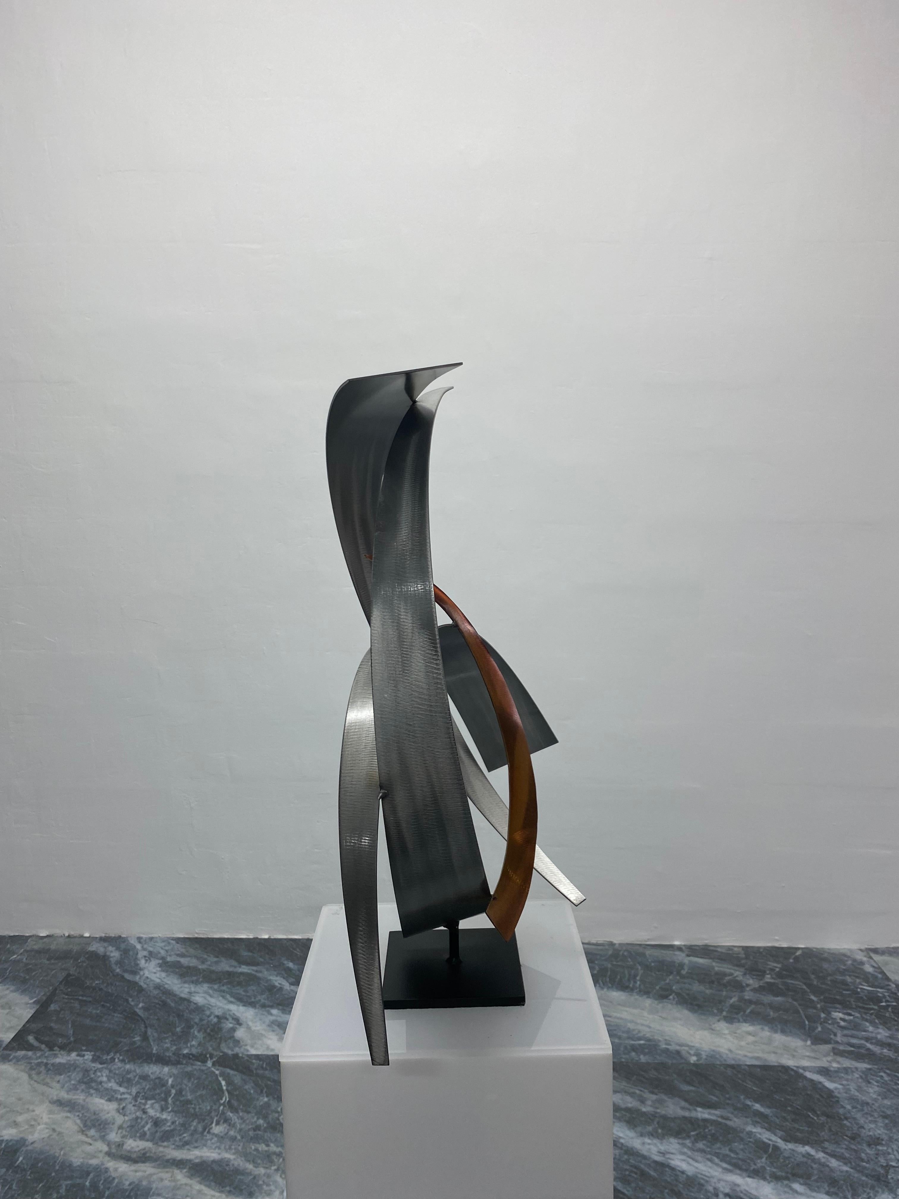Brushed steel and copper sculpture on black steel base by Curtis Jeré Artisan House, 2009. Signed.