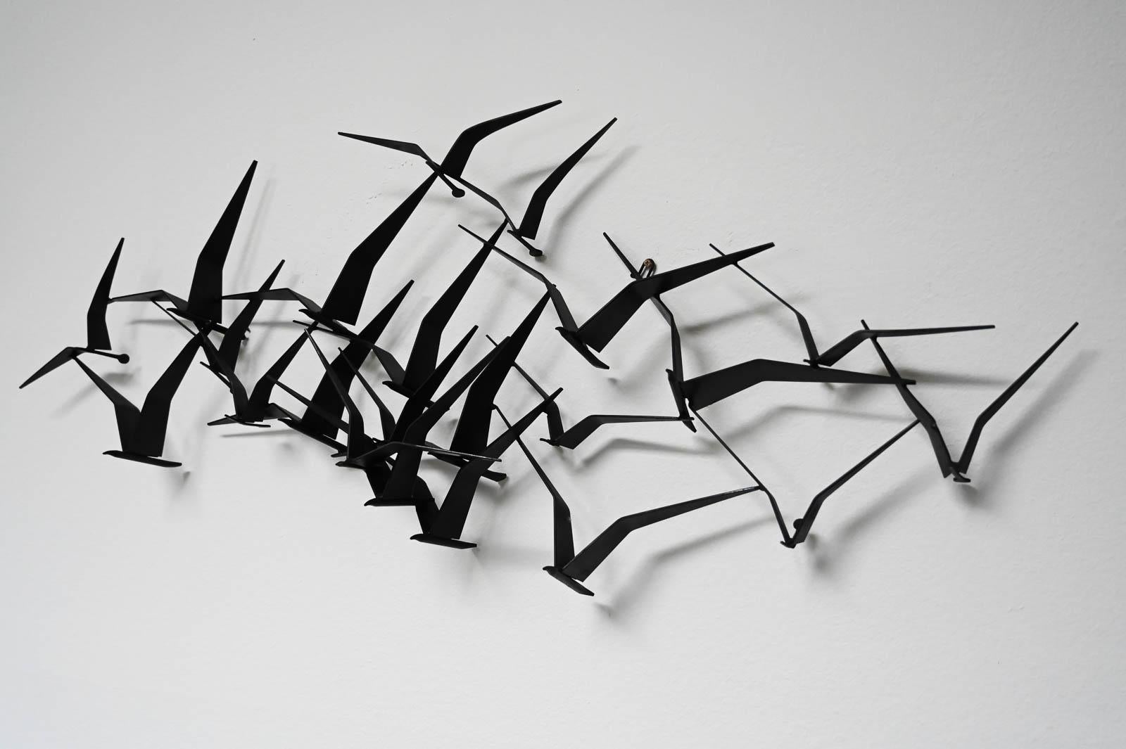 birds in flight sculpture