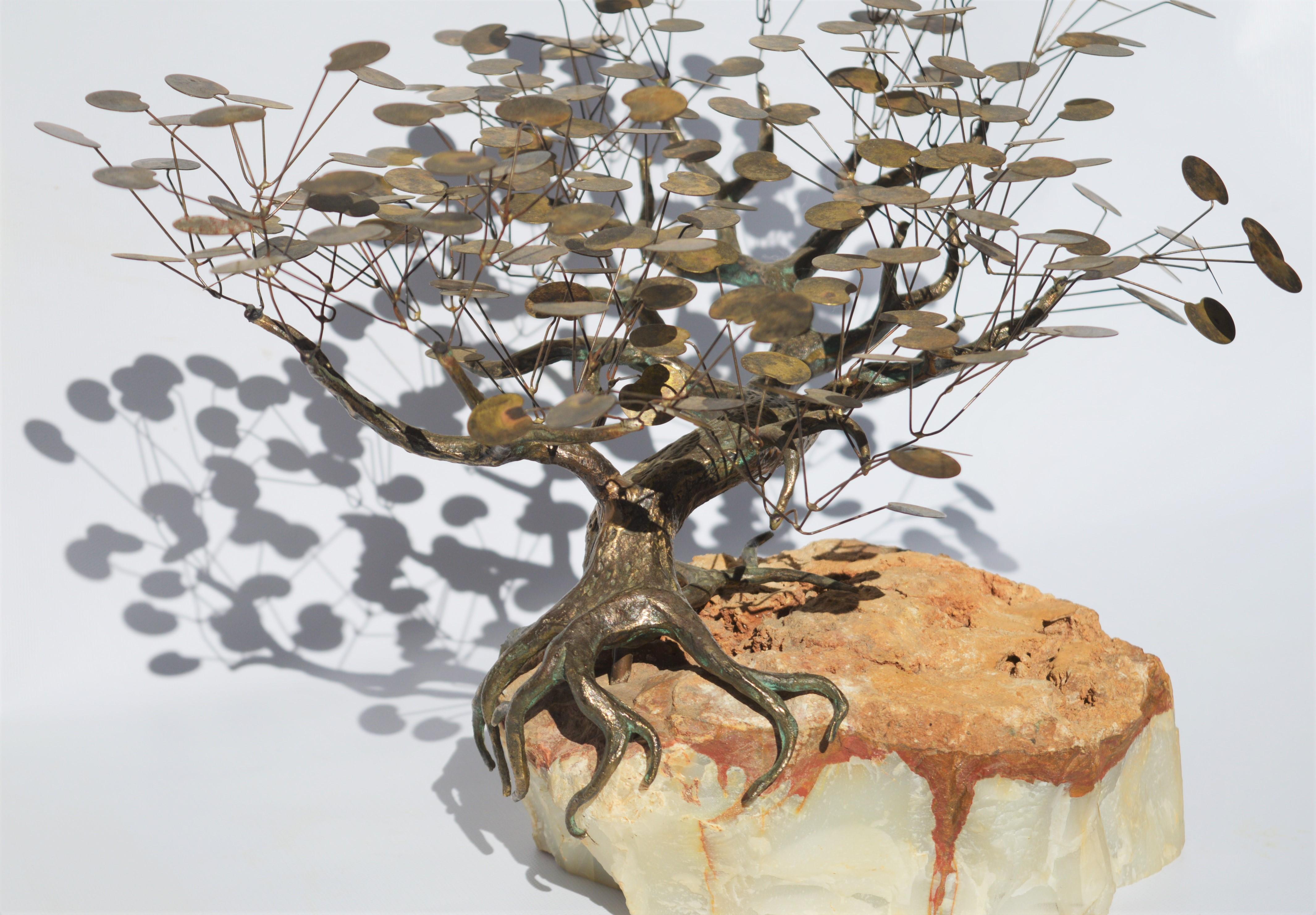 This amazing Curtis Jere sculptures is truly one of my all time favorites! Featuring a sculptural brass tree with defined roots that wraparound the marble base and branches that fork delicately on thin metal stems to the rare copper lilypad shaded