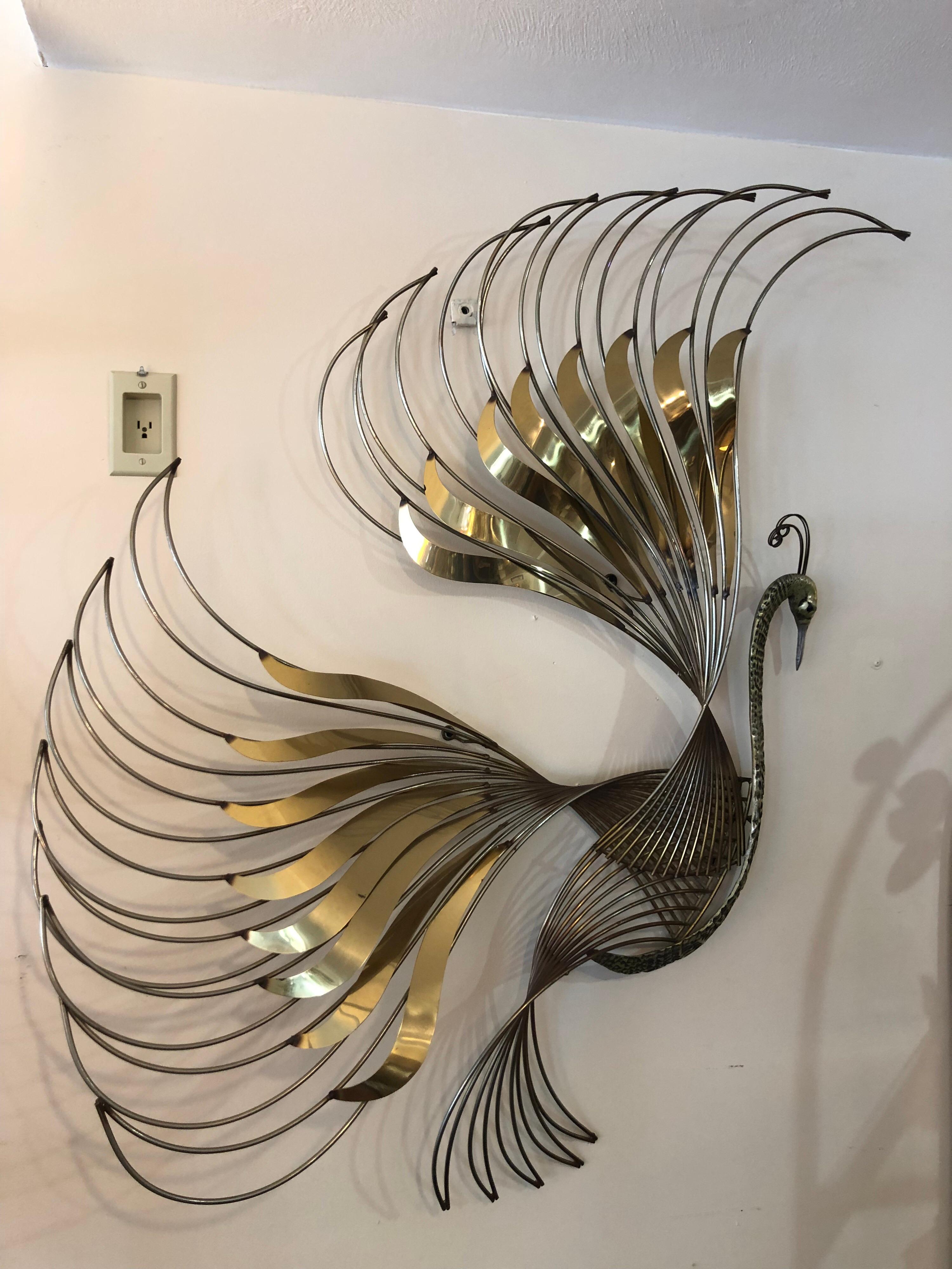 Curtis Jere brass peacock bird of paradise wall sculpture. Gorgeous intricate design to this statement piece. Perfect decor to glam up any room. In the style of Hollywood Regency.