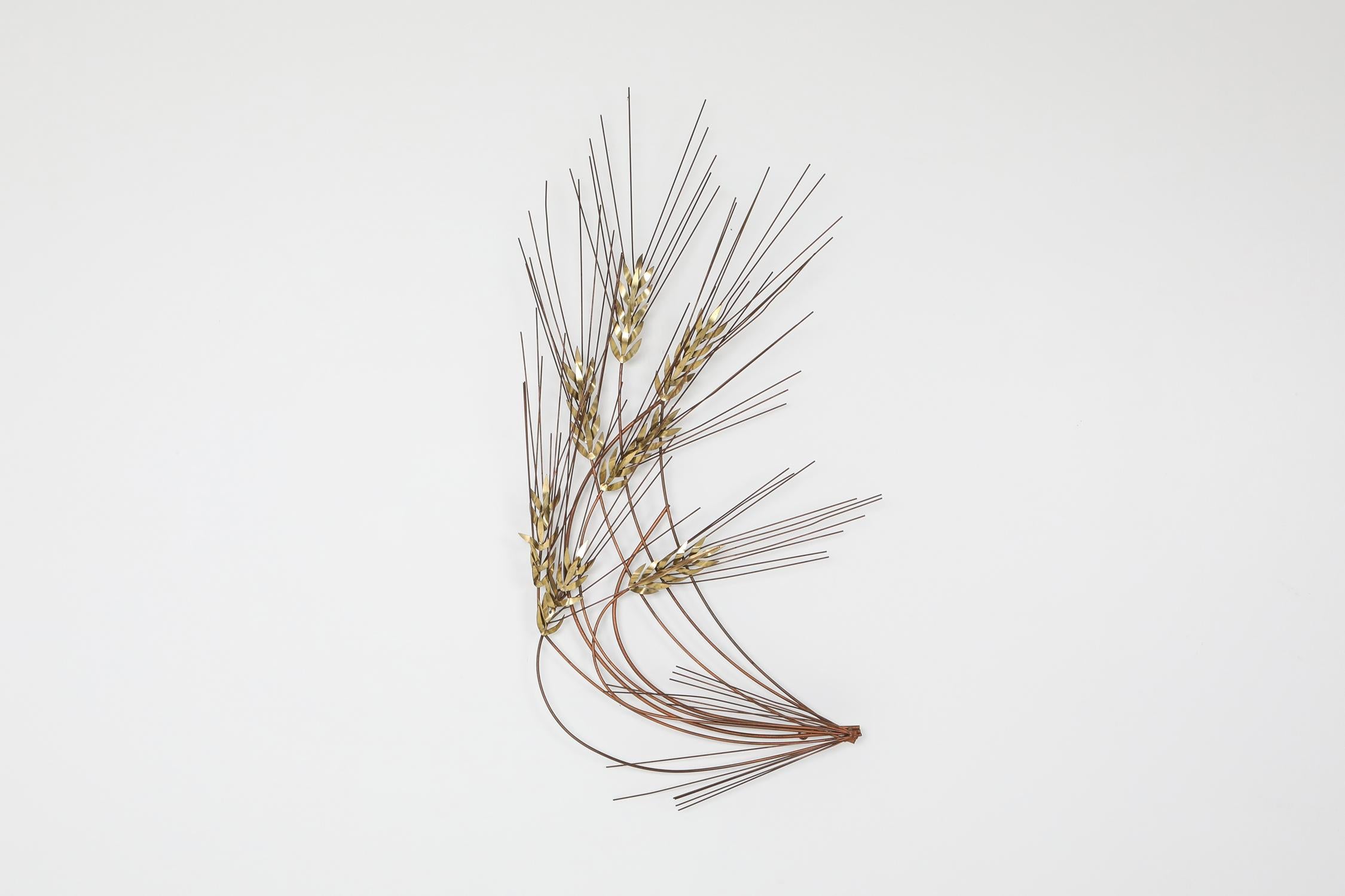 Wall sculpture 'weeds' by Curtis Jere, made out of brass and patinated brass. 
Artisan House, USA, 1988.
Would fit well in an eclectic Hollywood Regency inspired interior.
       
  