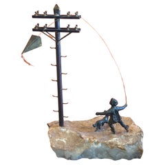 Curtis Jeré Bronze Figural Sculpture of Boy Flying Kite with Dog on Quartz 1970s