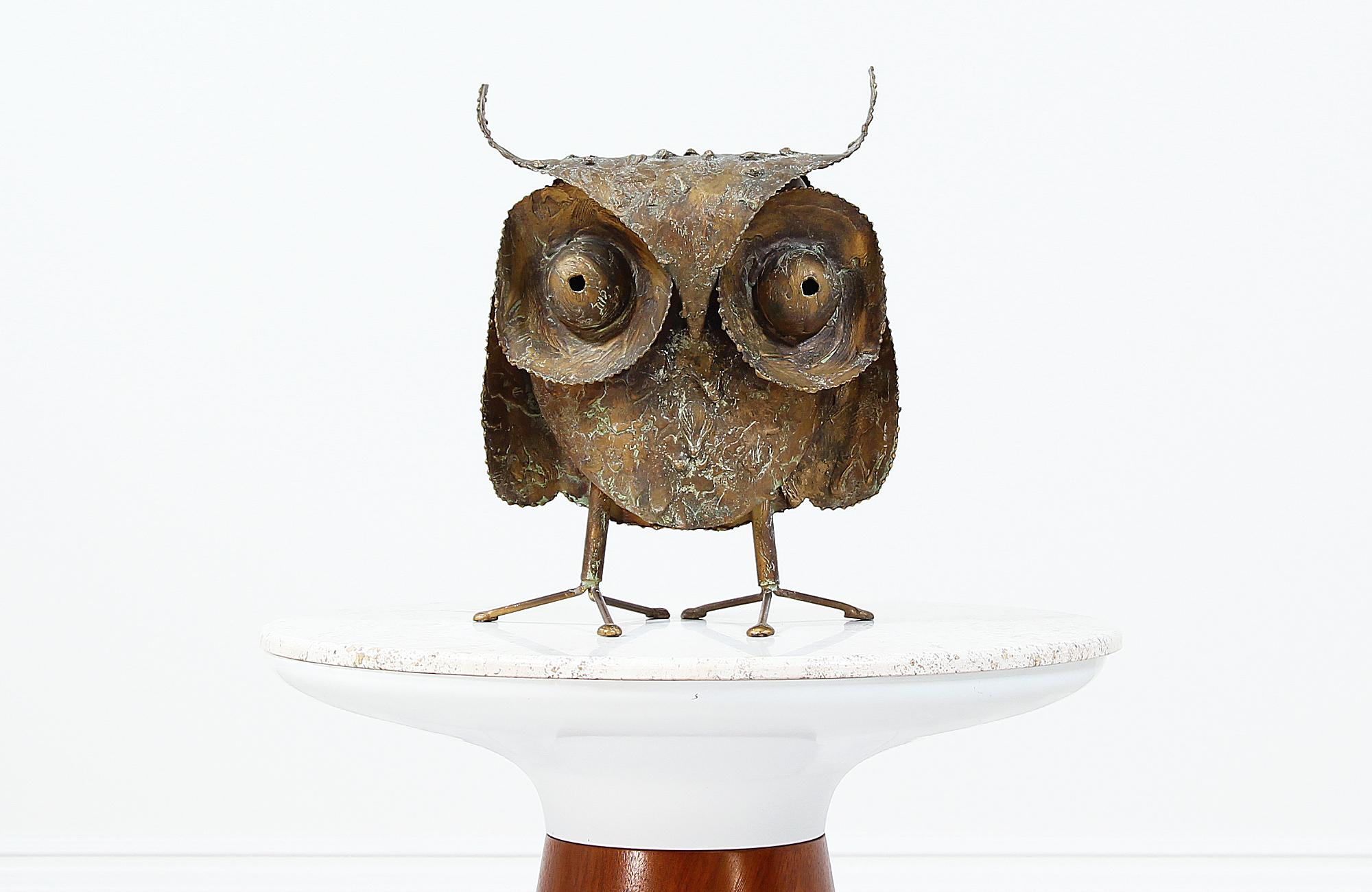Vintage Brutalist metal owl sculpture designed by Curtis Jere for Artisan House in the United States signed 1969. This modernist sculpture is made of Brutalist drip finished on metal that shows a beautiful patina from age. Overall this stylish