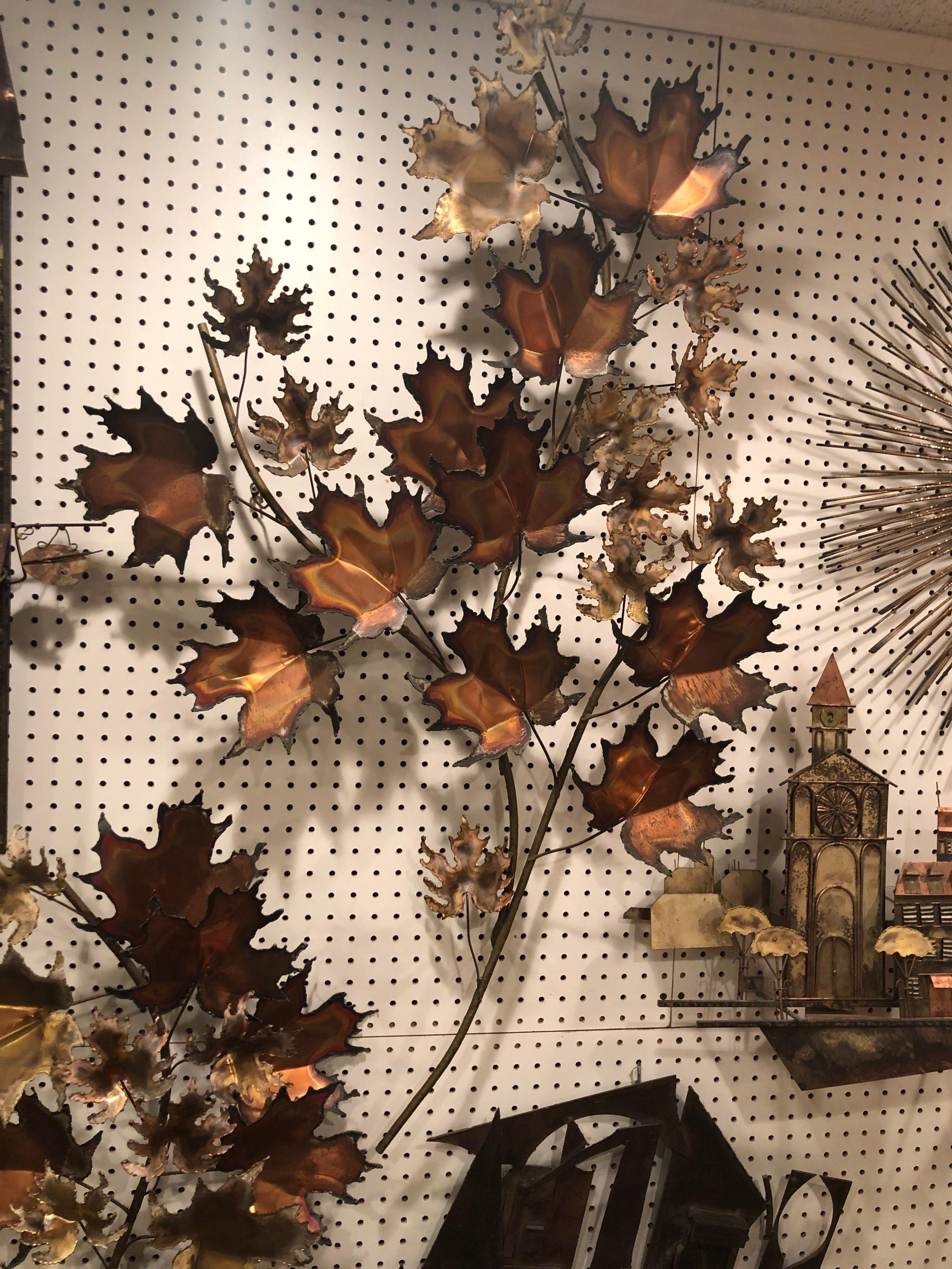 Curtis Jere Brutalist leaf wall sculpture . Brutalist torch cut design with multicolored mixed metal leaves. Perfect for above a fireplace or sofa. Two smaller ones also available. See photos of one smaller one.
