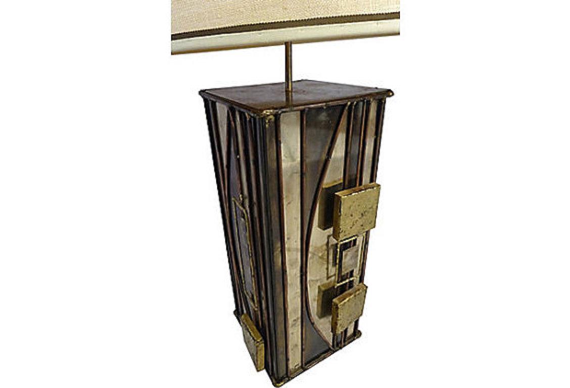 Curtis Jere Brutalist polished and patinated metal table lamp, signed.

This lamp has been professionally rewired. 250W-max standard bulb. Lampshade not included, please inquire for availability of options.

Dimensions: Base 18