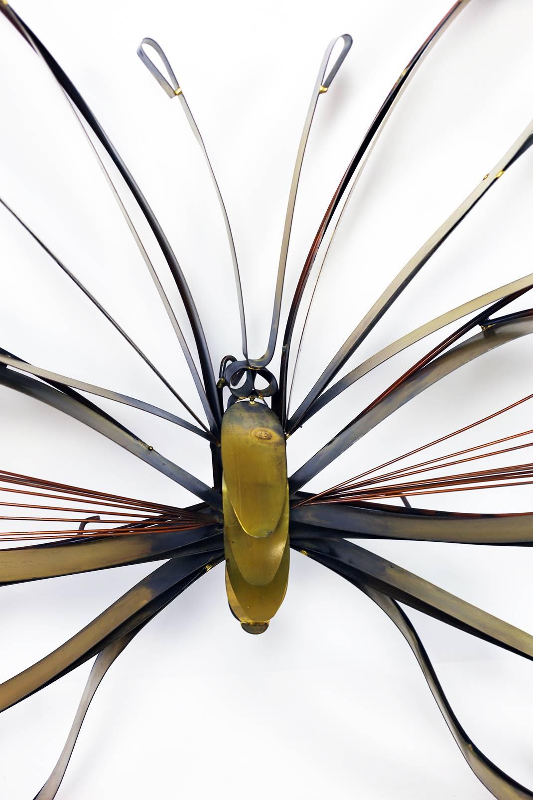 Rare large Curtis Jere abstract butterfly sculpture, circa 1978. A graceful modern composition of brass ribbons with copper wire accents. Signed on the lower right.