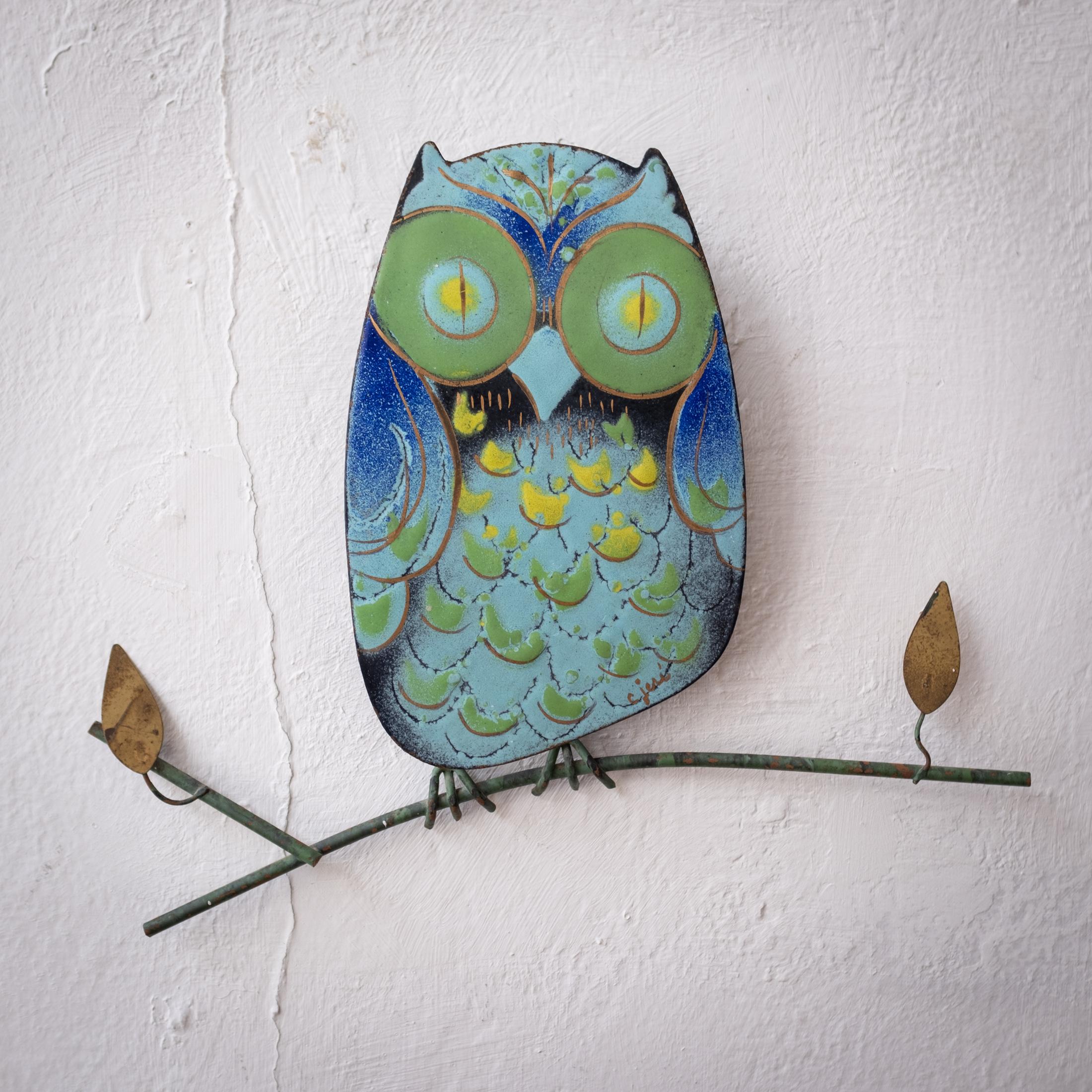 Curtis Jere enamel on metal owl wall sculpture. Vivid colors on this wall mounted mid-century piece. 1960s. Signed.