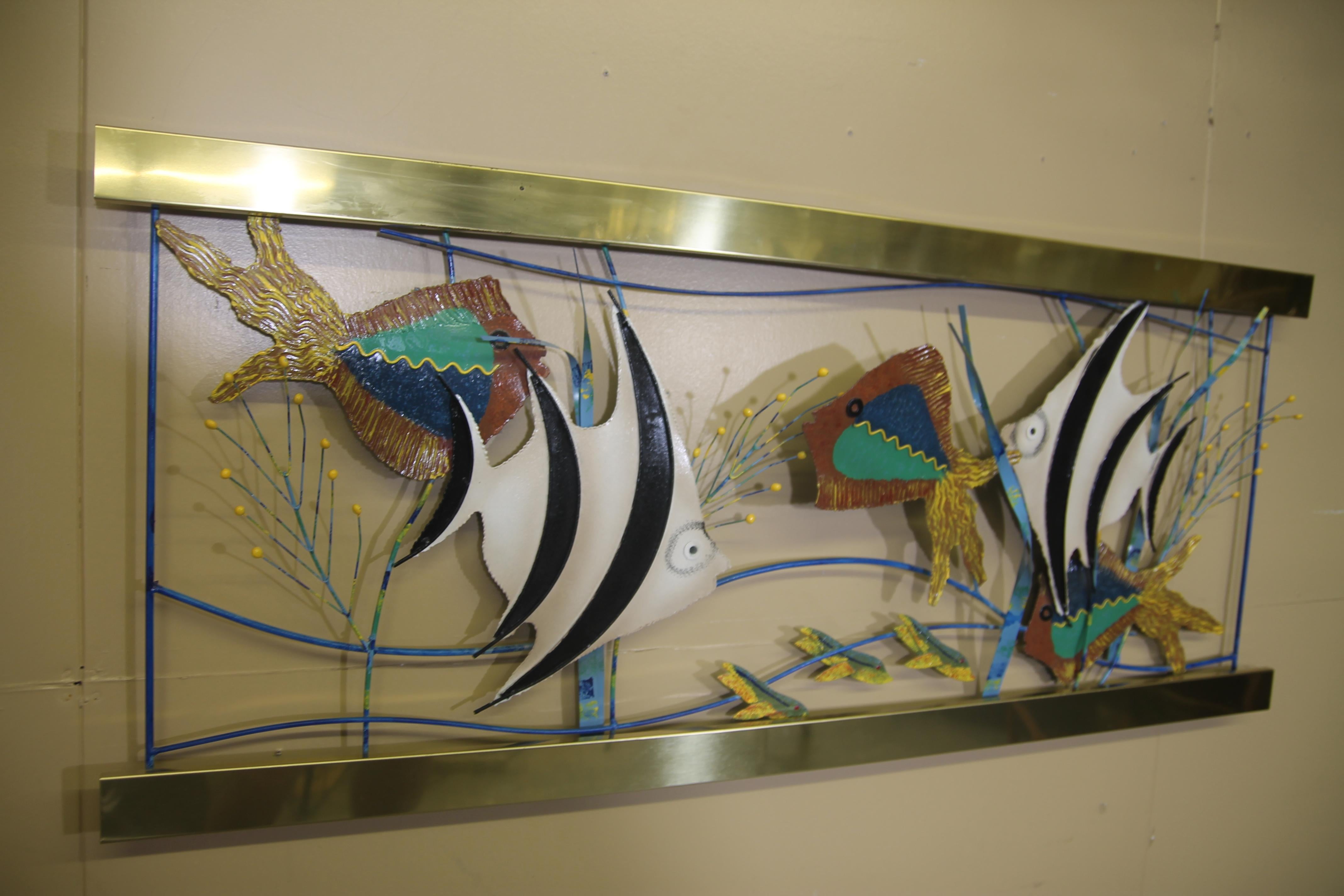 Rarely seen monumental Curtis Jere fish aquarium from 1993. This wall hanging piece is made of brass and painted metal. The wall art is dated and signed. It is in nice vintage condition.