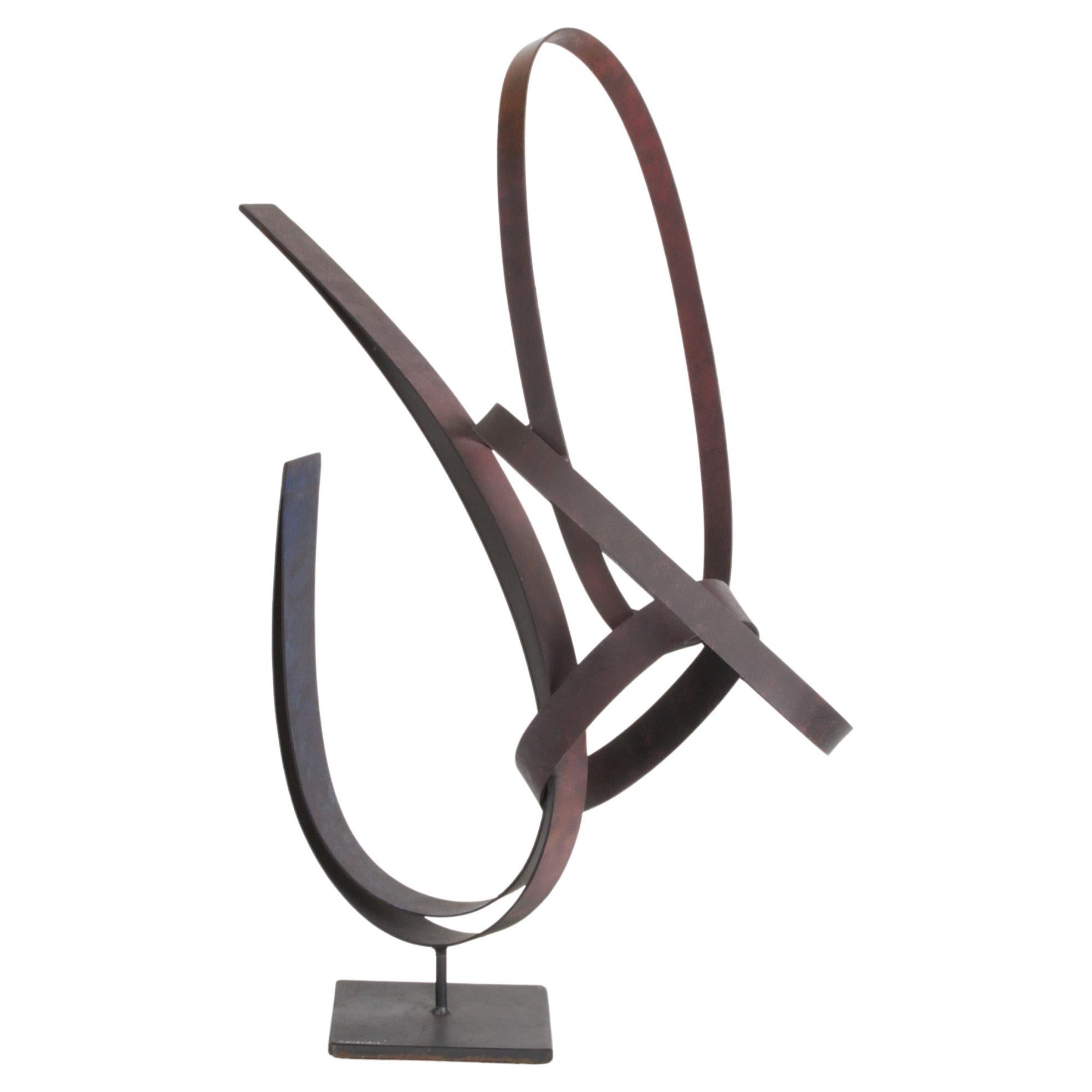 Amazing large Curtis Jeré for Artisan House flat steel modernist ribbon abstract table sculpture titled 