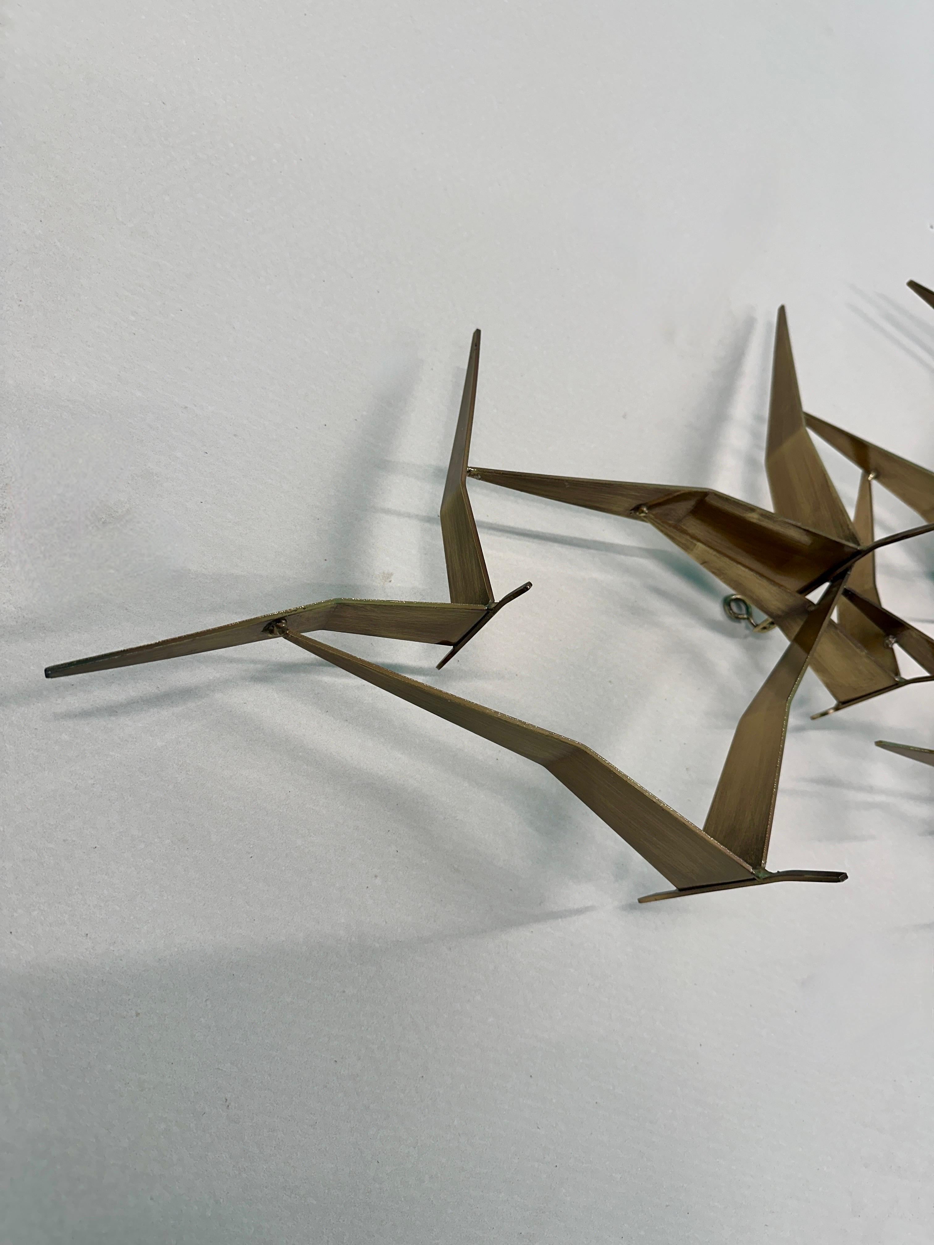 Patinated A Large Wall Mounted Sculpture By Curtis Jere