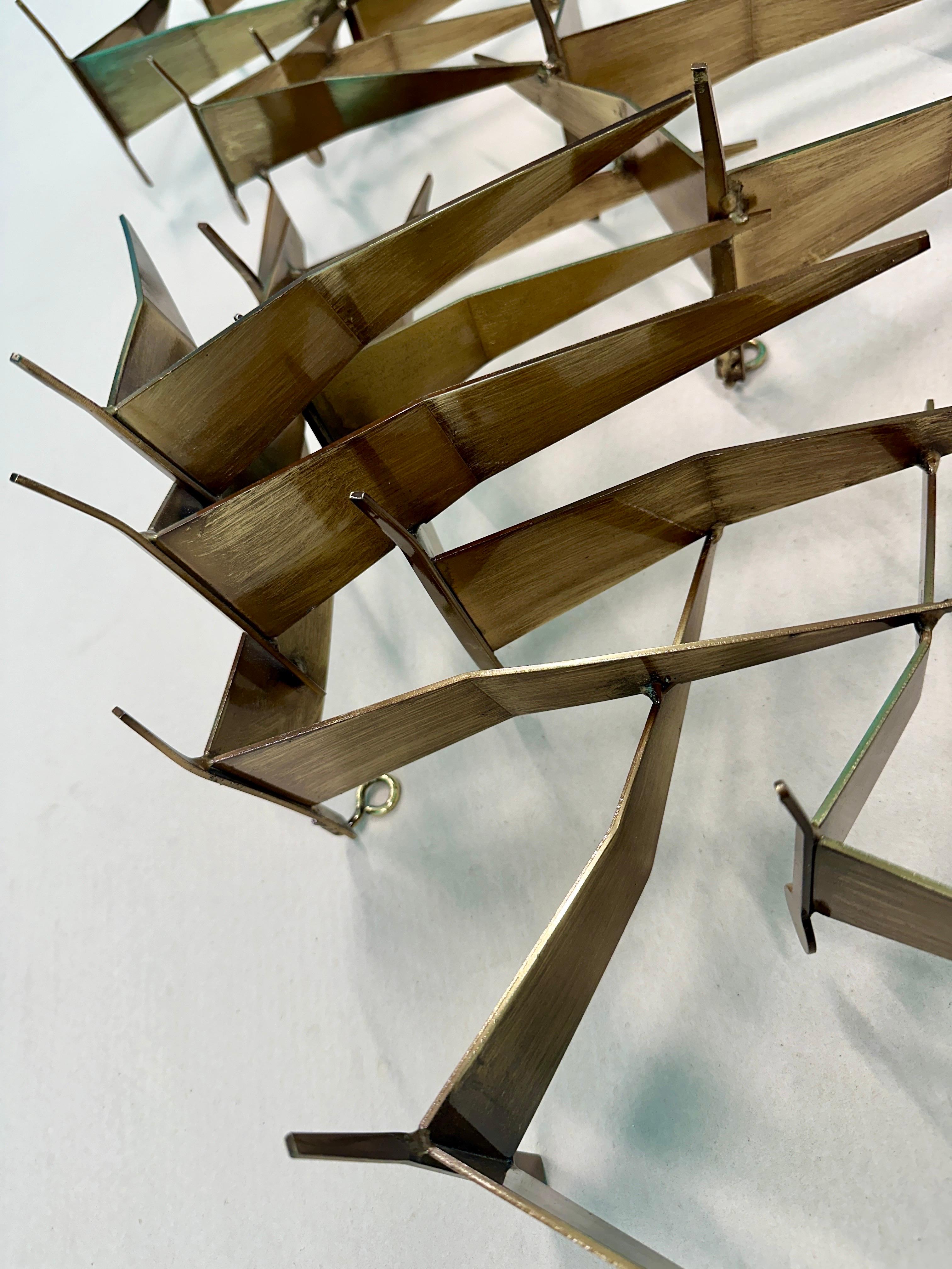 A Large Wall Mounted Sculpture By Curtis Jere 1