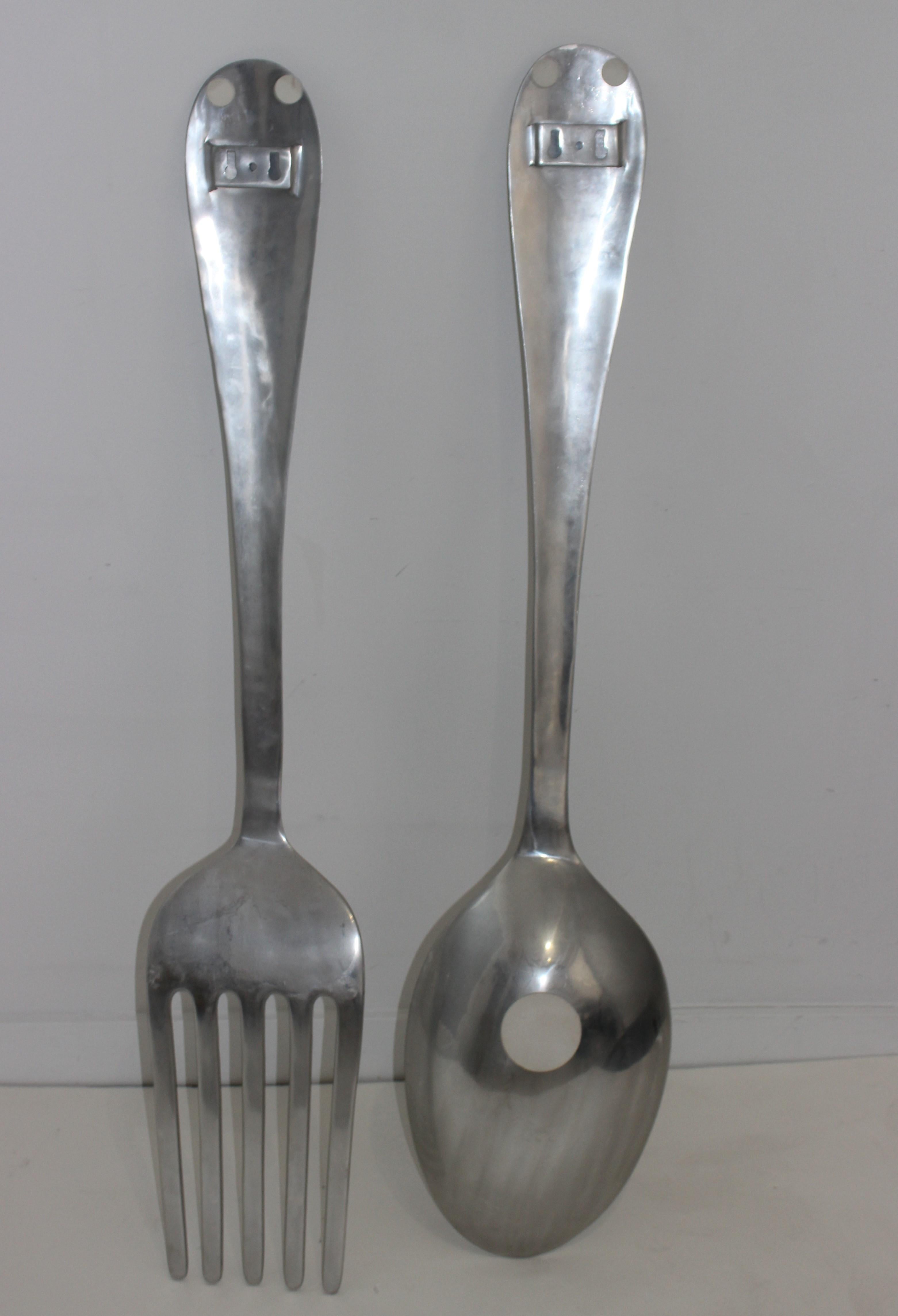 Polished Curtis Jere Fork and Spoon Wall Sculptures, a Set of 2