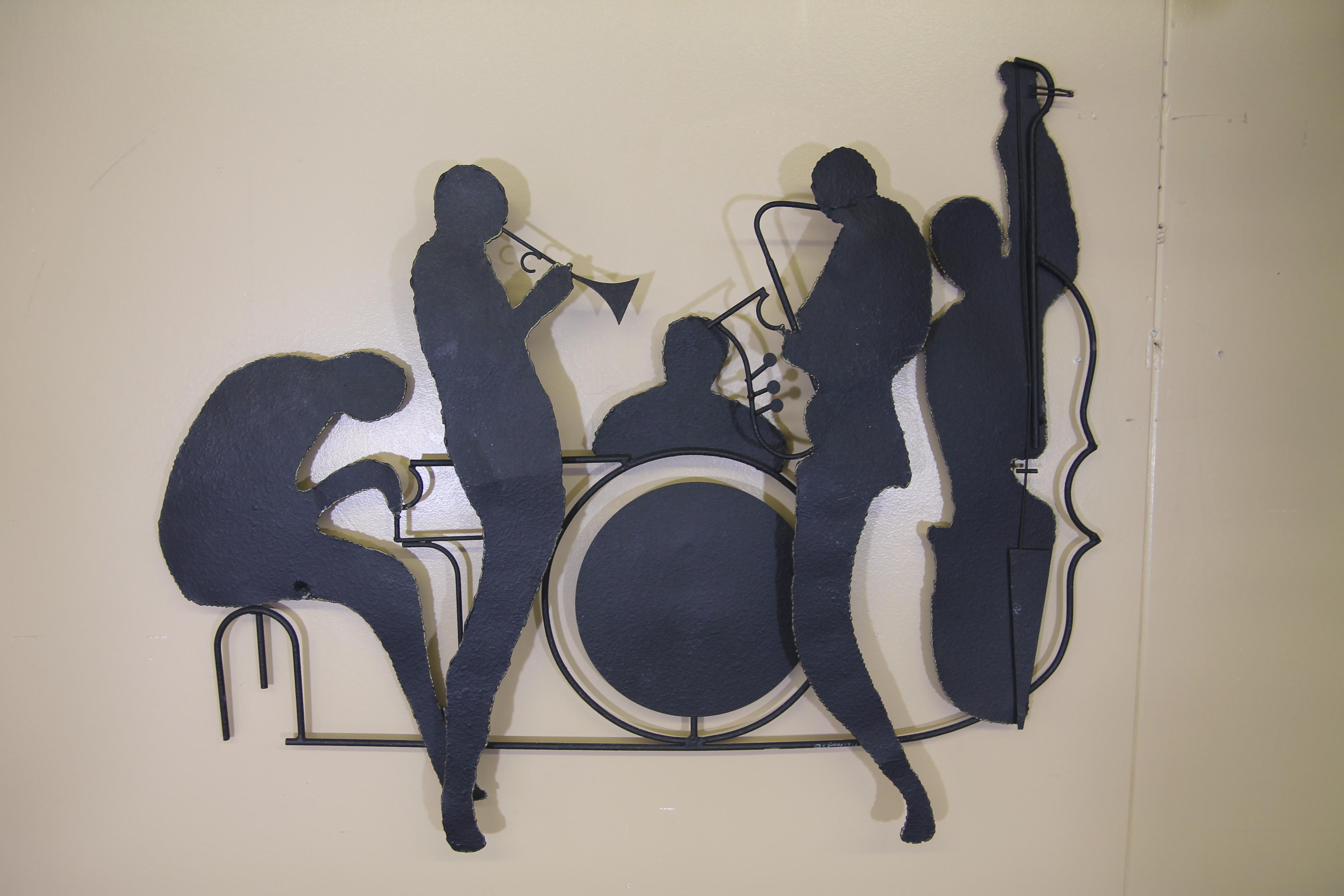 Curtis Jere 5-piece jazz band wall hanging. Very nice simple wall art that’s in good vintage condition. Will look great in your music room at home. Piece is dated and signed 1991.