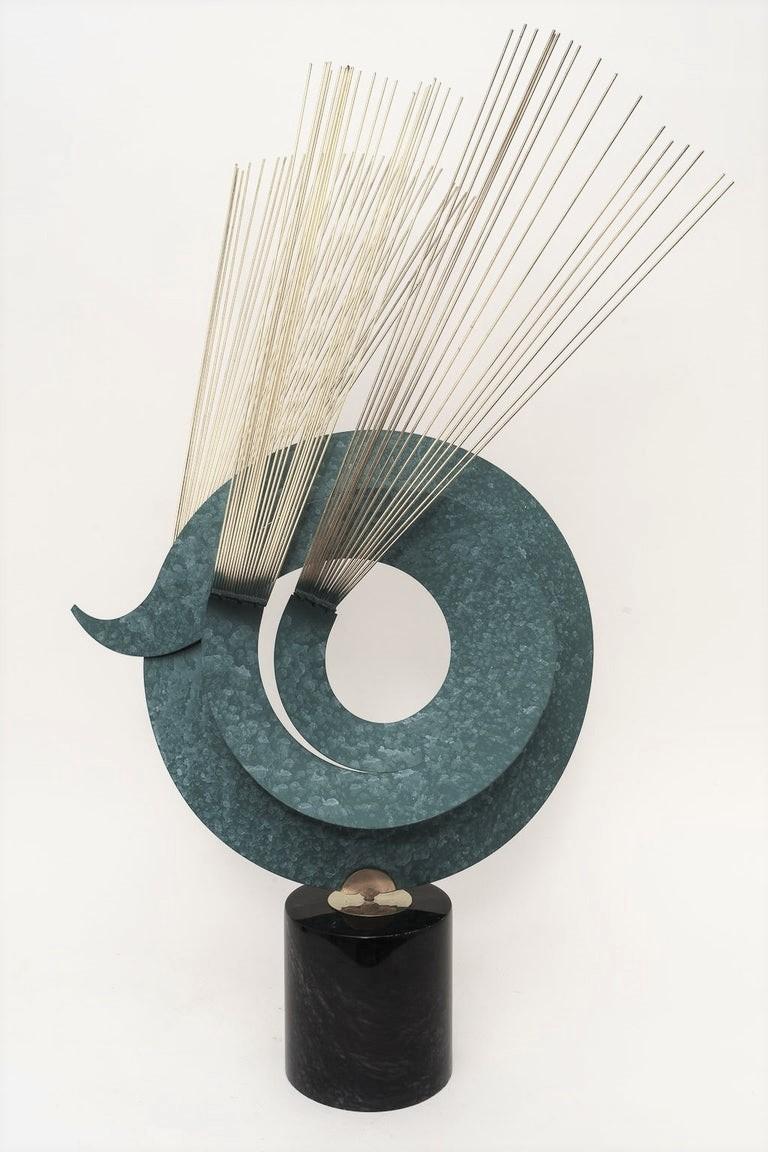 Kinetic sculpture in Verdi Gris coloration, marble and brass by Curtis Jere Artisan House, 1996

Overall size is 23 wide by 15 deep and 37