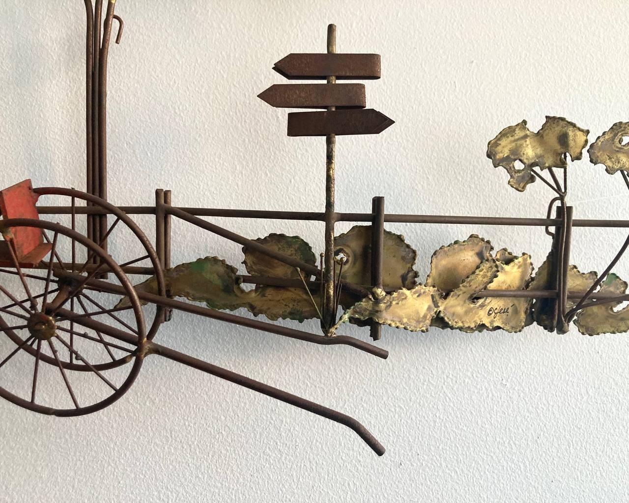 Vintage Forged metal wall structure by Famous American Artist Curtis Jere. 

Circa 1970s.

There is a signature of the author. 

A forged wall sculpture in the form of a carriage with scenery is not just a metal structure, it is a modest work