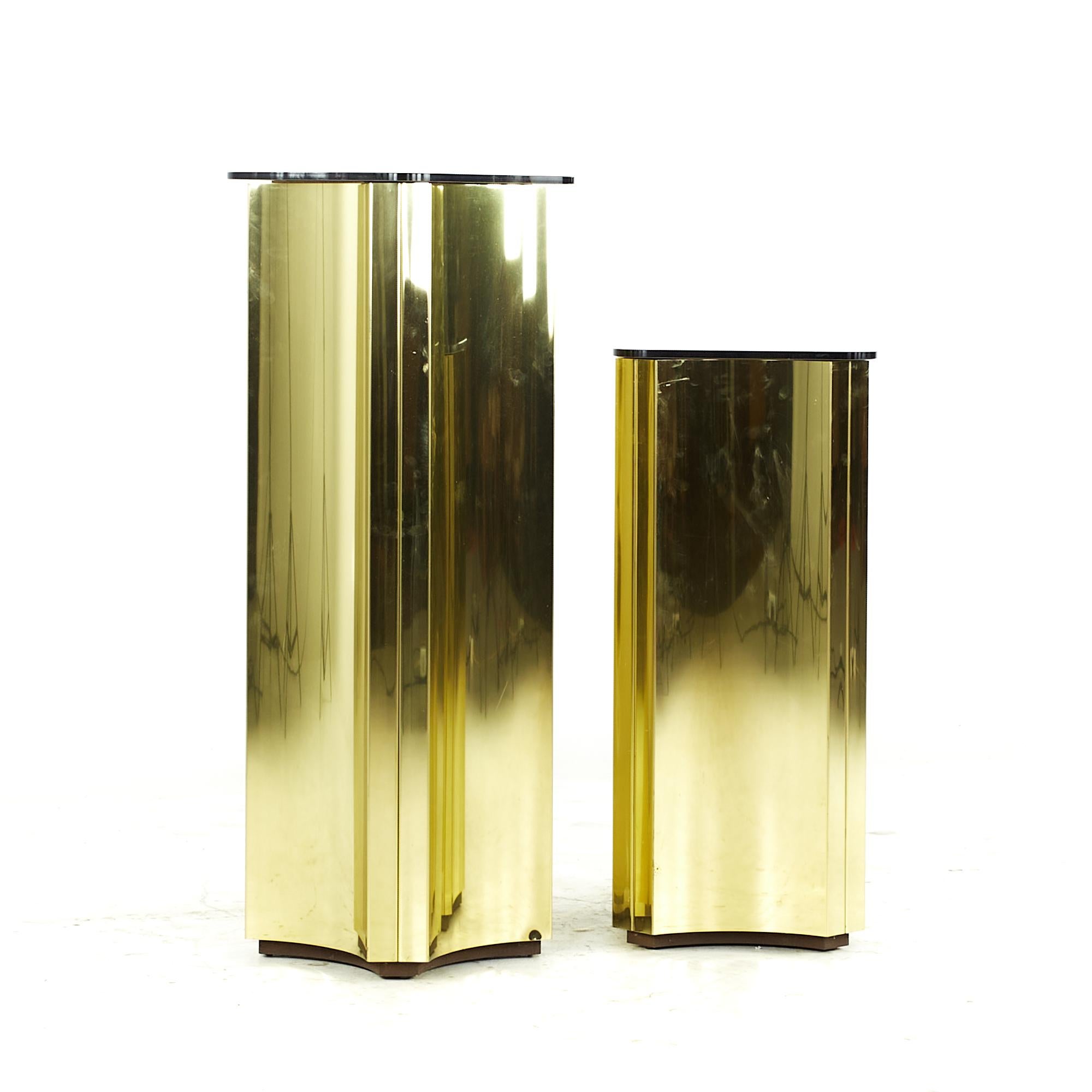 Curtis Jere midcentury Brass Display Pedestals - Pair

The small pedestal measures: 12.5 wide x 12.5 deep x 28.25 inches high
The large pedestal measures: 12.5 wide x 12.5 deep x 36.25 inches high

All pieces of furniture can be had in what we
