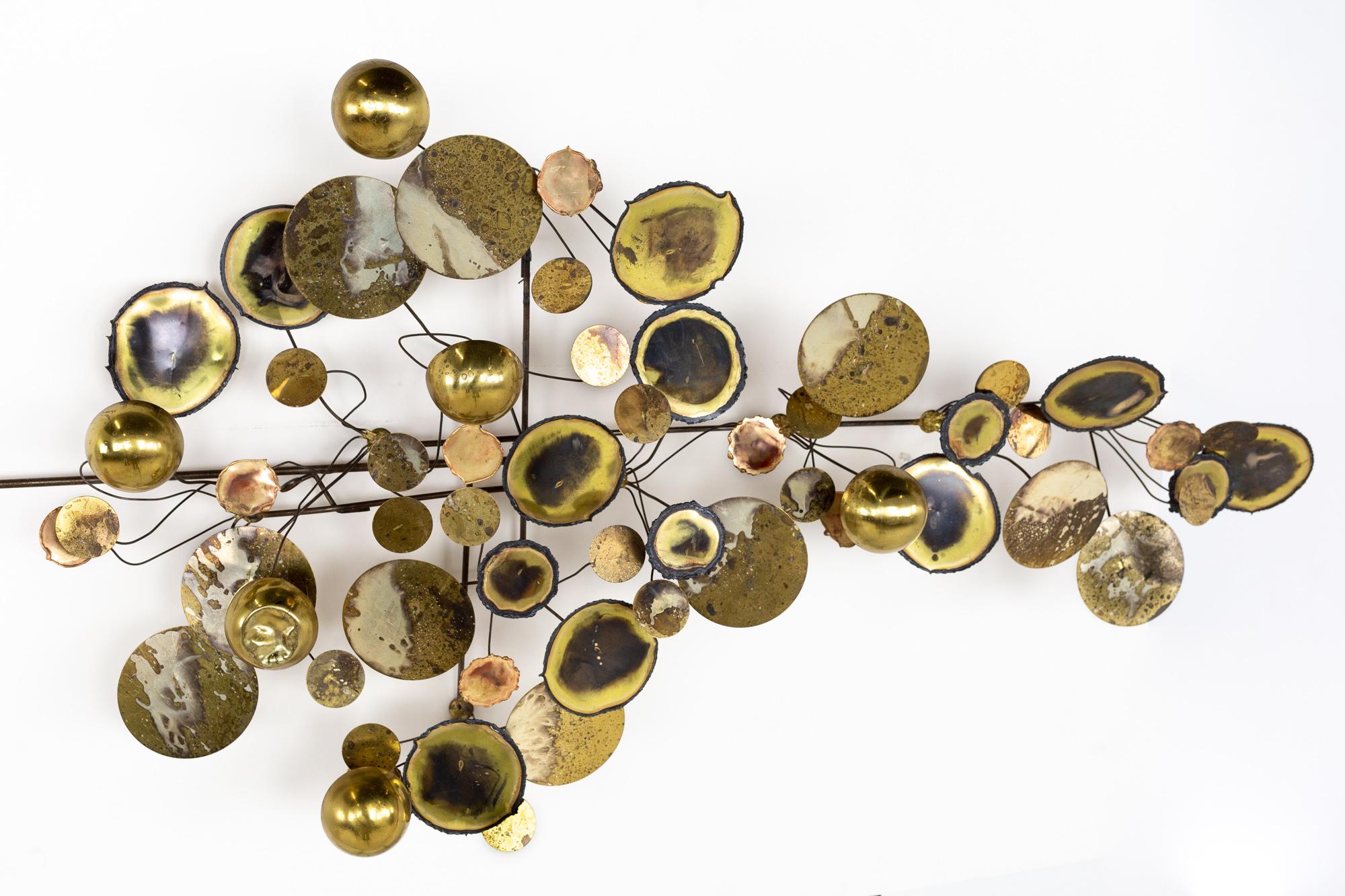 Curtis Jere mid century brass raindrops sculpture
This piece measures: 22 wide x 7.5 deep x 40.5 inches high

All pieces of furniture can be had in what we call restored vintage condition. That means the piece is restored upon purchase so it’s