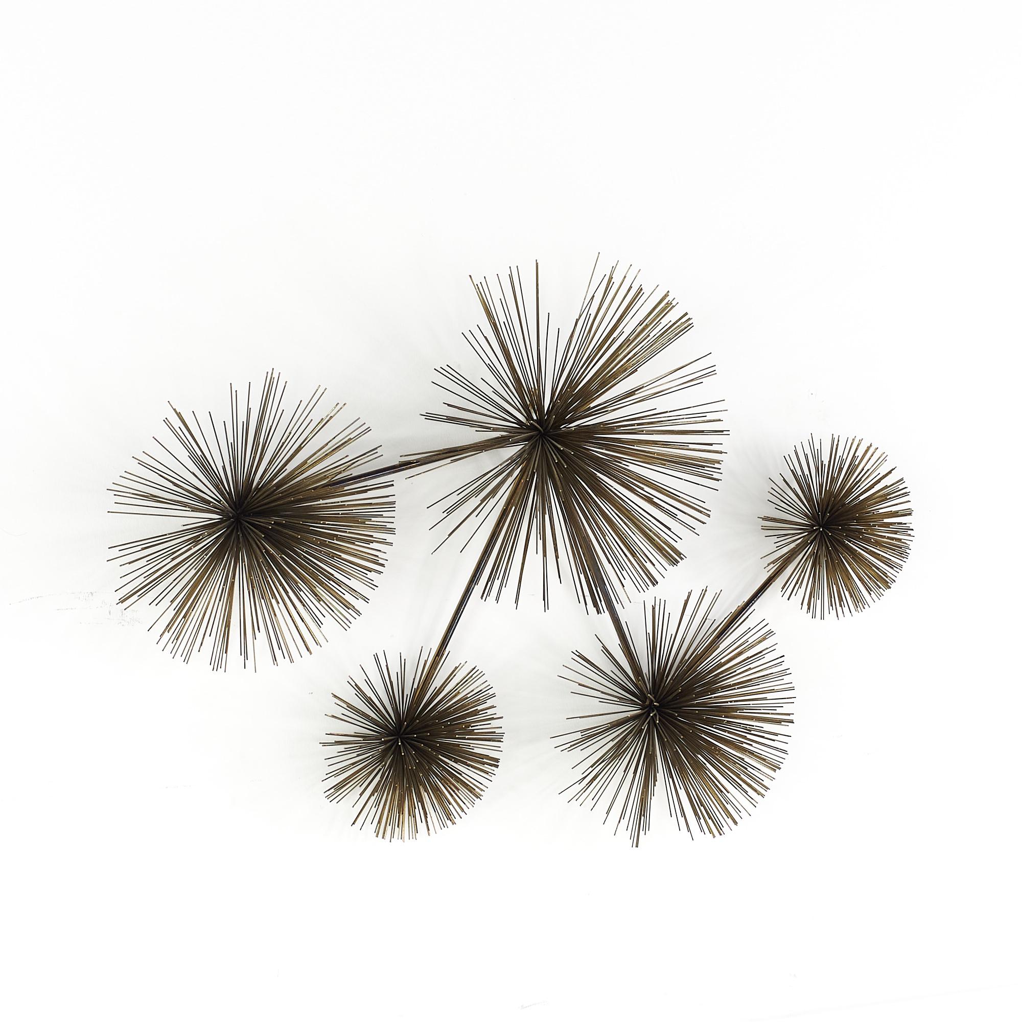 Curtis Jere Mid Century Brass Wall Urchin

This artwork measures: 39 wide x 9 deep x 26 inches high

Great Vintage Condition


We take our photos in a controlled lighting studio to show as much detail as possible. We do not photoshop out blemishes.