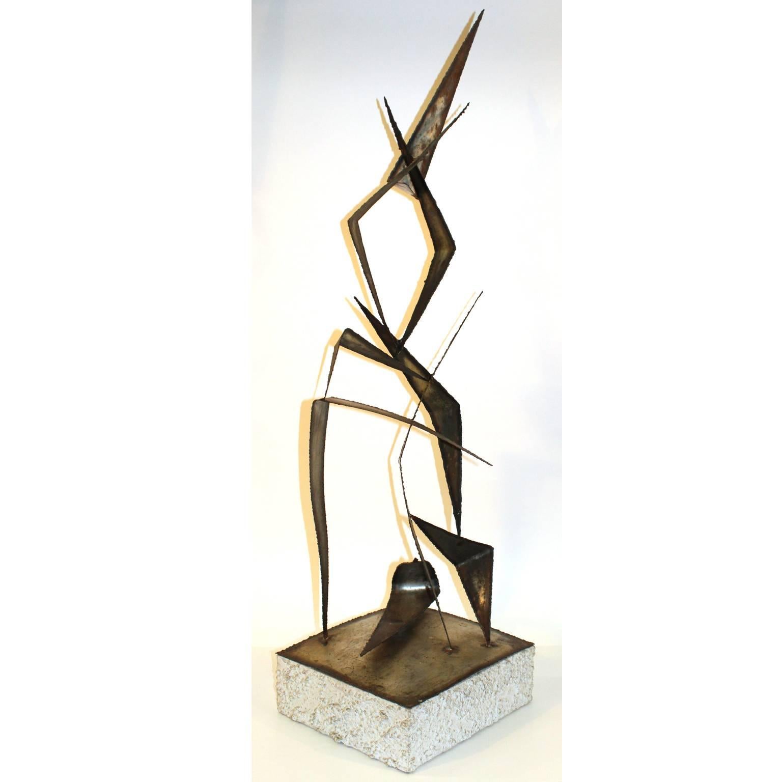 A Curtis Jere 1960s-1970s midcentury Brutalist sculpture made of torched and welded metal on top of a faux cement base. Signed Curtis Jere on the base. Original burnished torched patina and rough finish.