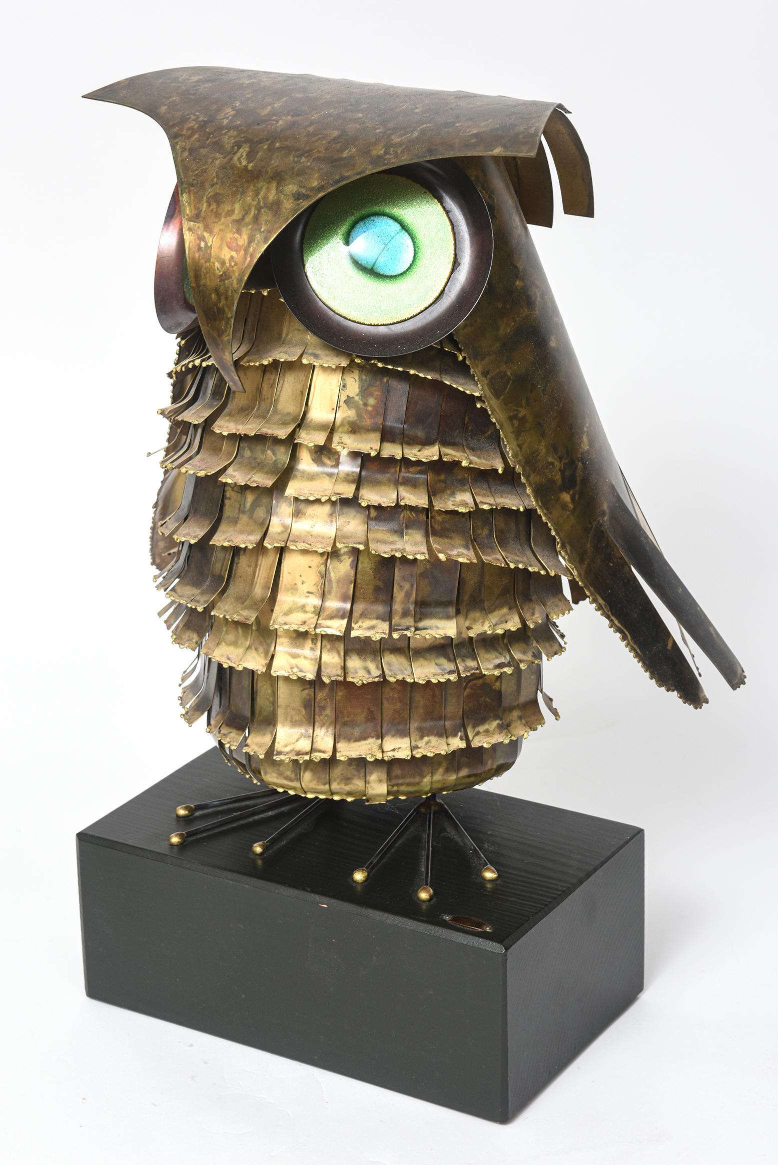 Original 1967 Curtis Jere metal owl sculpture featuring a richly patinaed metal body with multi color enameled eyes. Signed 