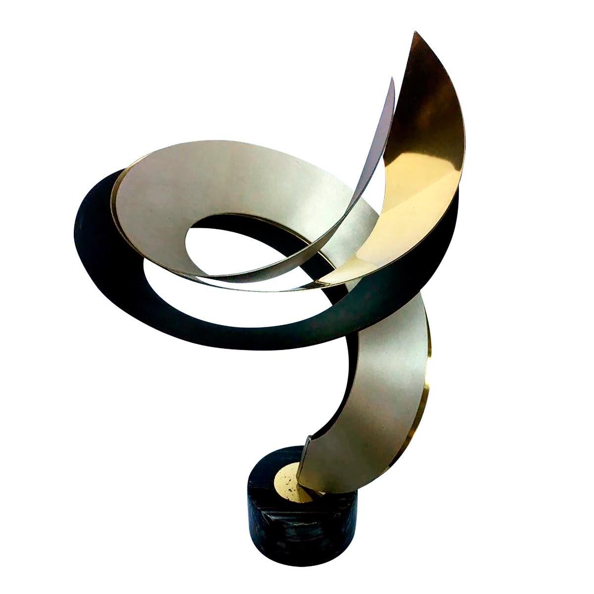 Mixed metal modern table sculpture by Curtis Jere featuring brass, black and matte silver. Polished six inch marble base. No signature.
     