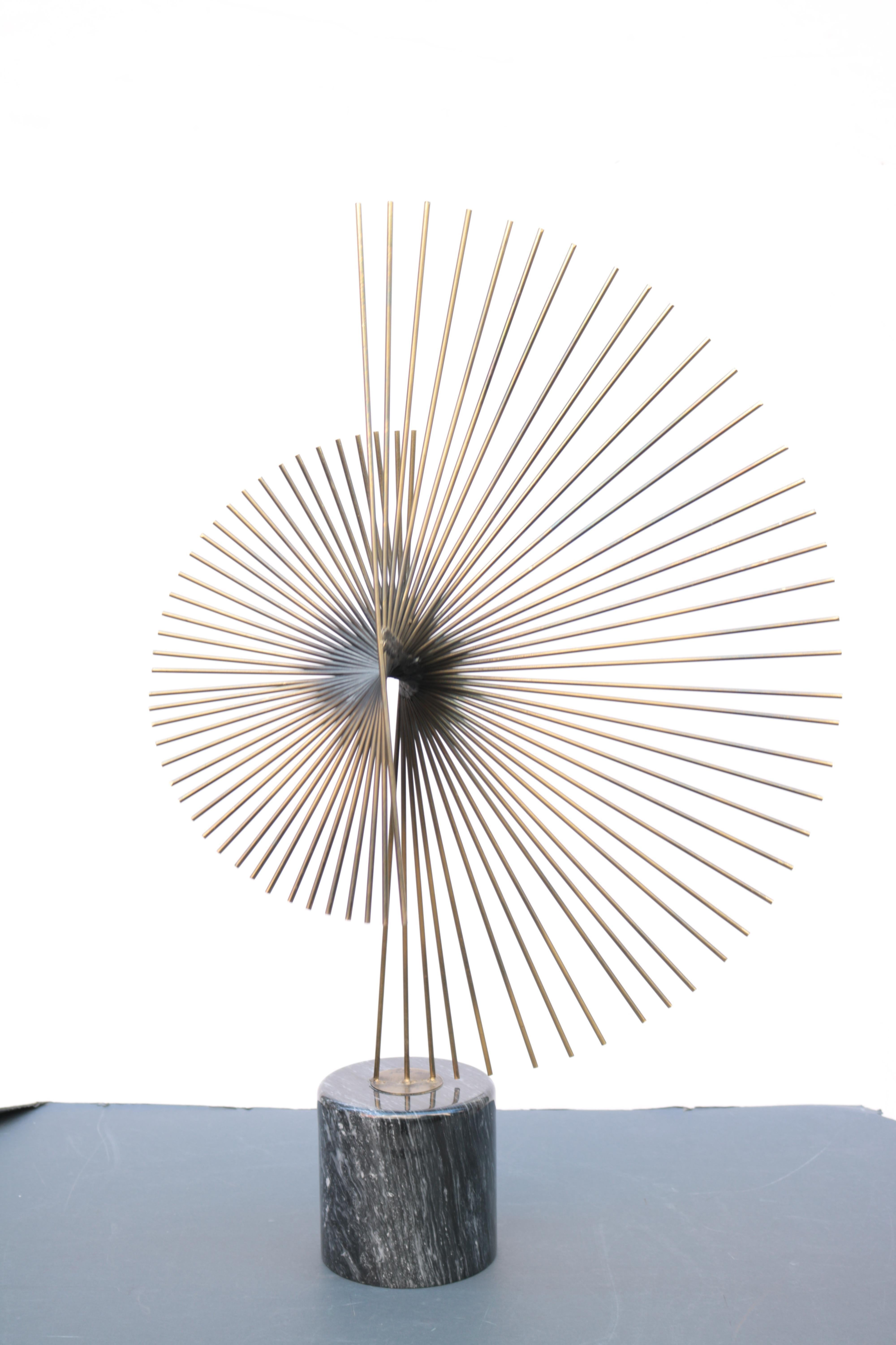 A Curtis Jere Modernist table sculpture.
Patinated brass form with a marble base.
With original signature.