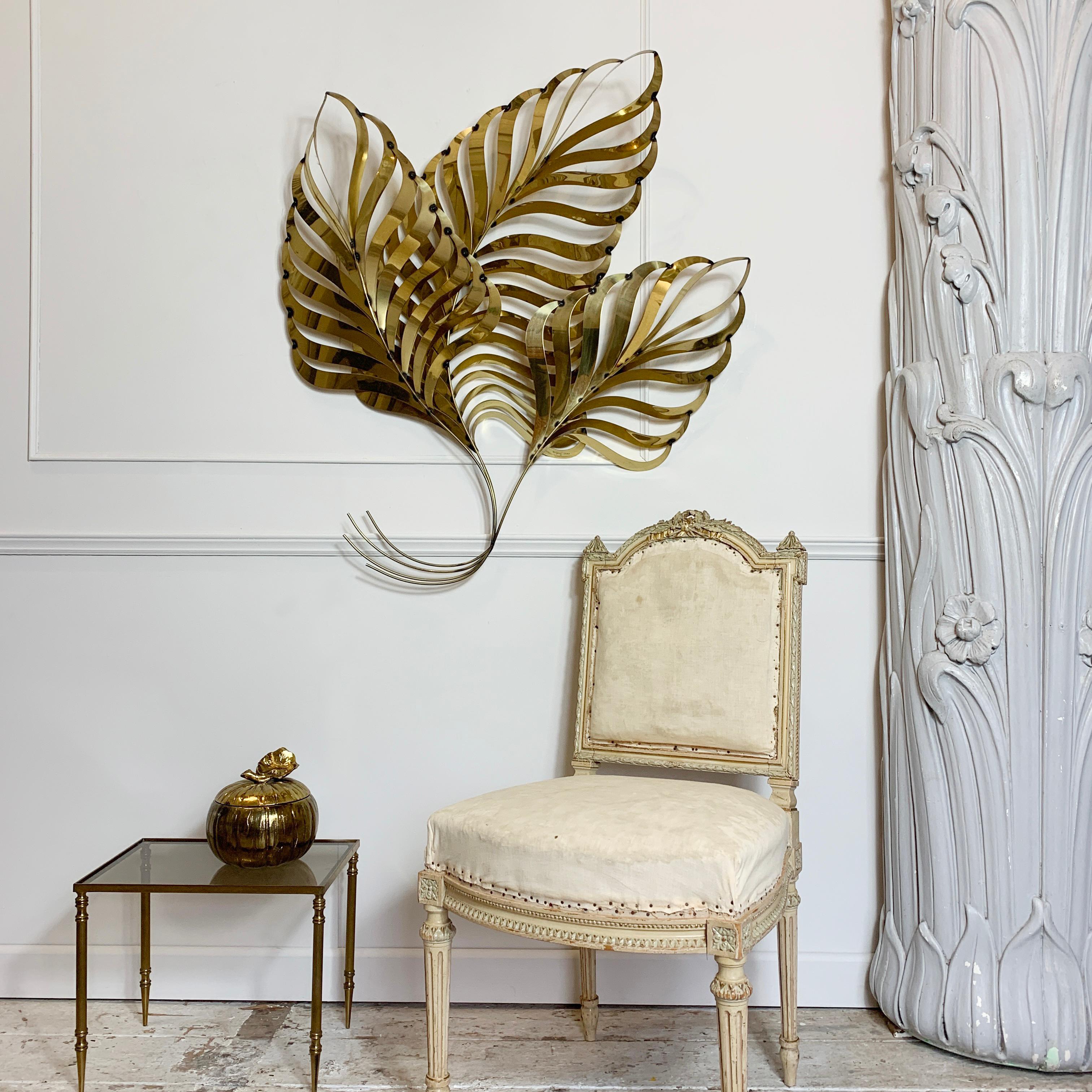 Monumental leaf wall applique, hand crafted by C Jere in their California based workshop, and fully signed C Jere 1991
The huge brass leaves are intricately cut and bonded together using small hand applied welds
Measures: 95cm height, 87cm width,