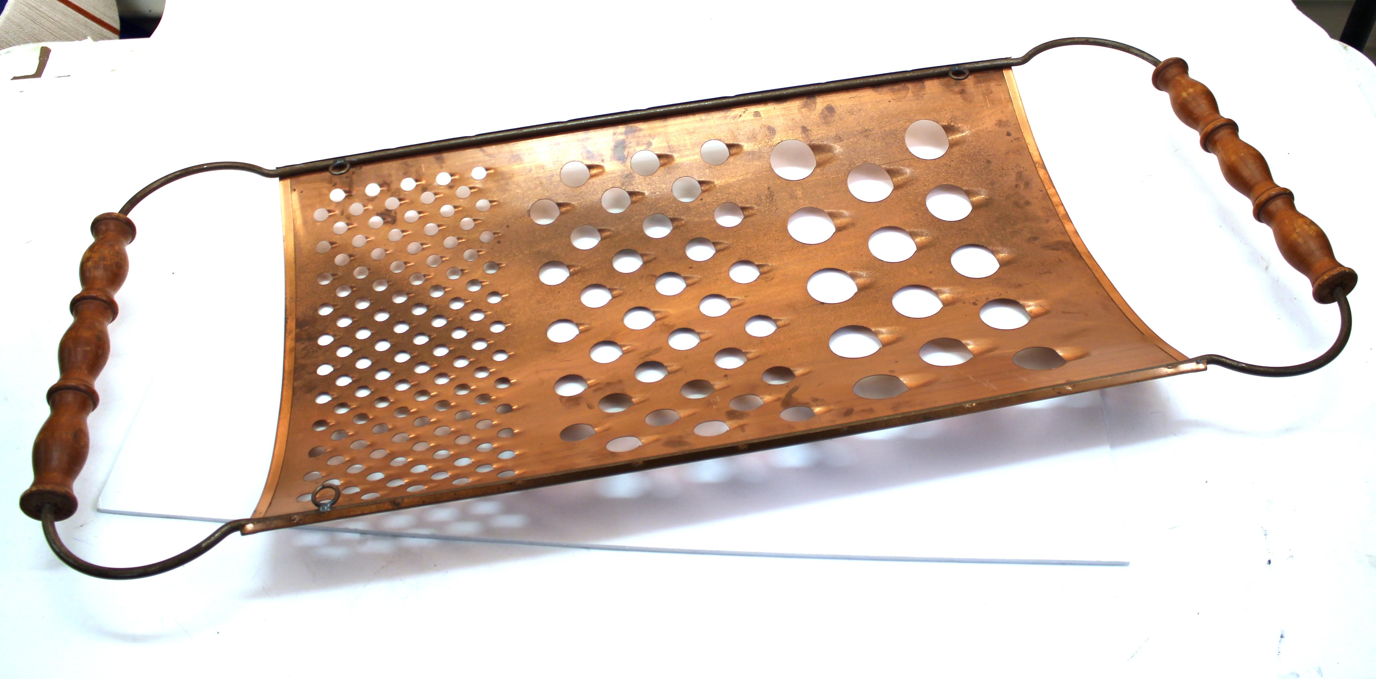 Mid-Century Modern oversized brass shredder or cheese grater designed by Curtis Jere in 1979. The piece is signed and dated and is in great vintage condition.