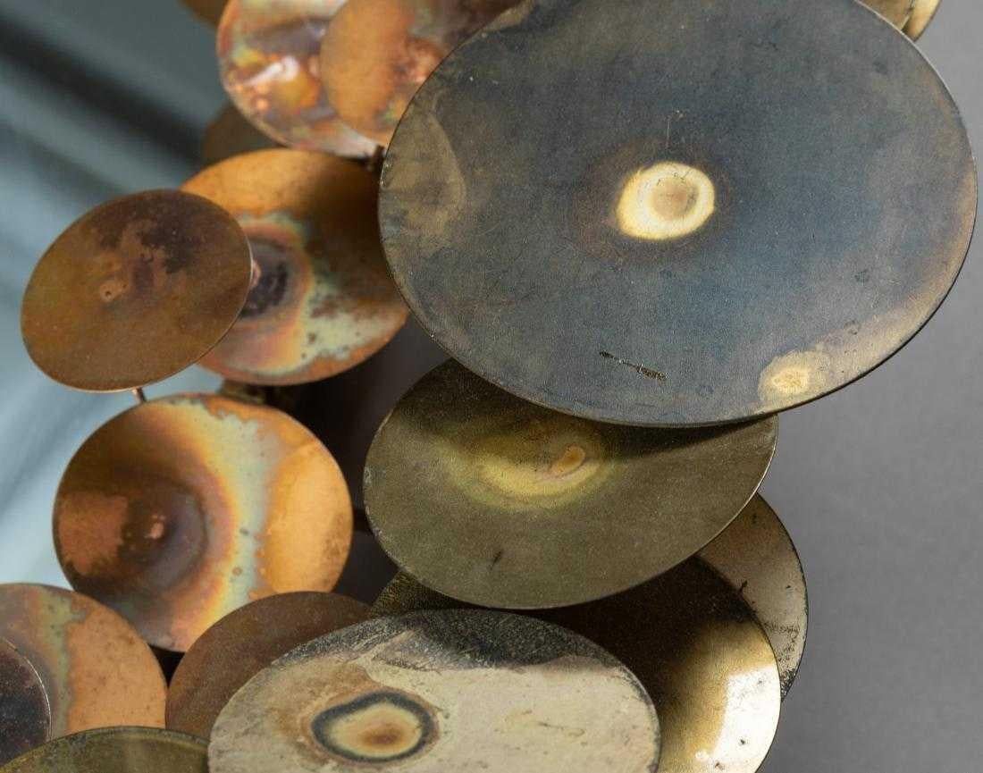 Curtis Jere raindrop mirror. Frame of mirror is made of circular shapes depicting raindrops in brass, copper and metal.  The 