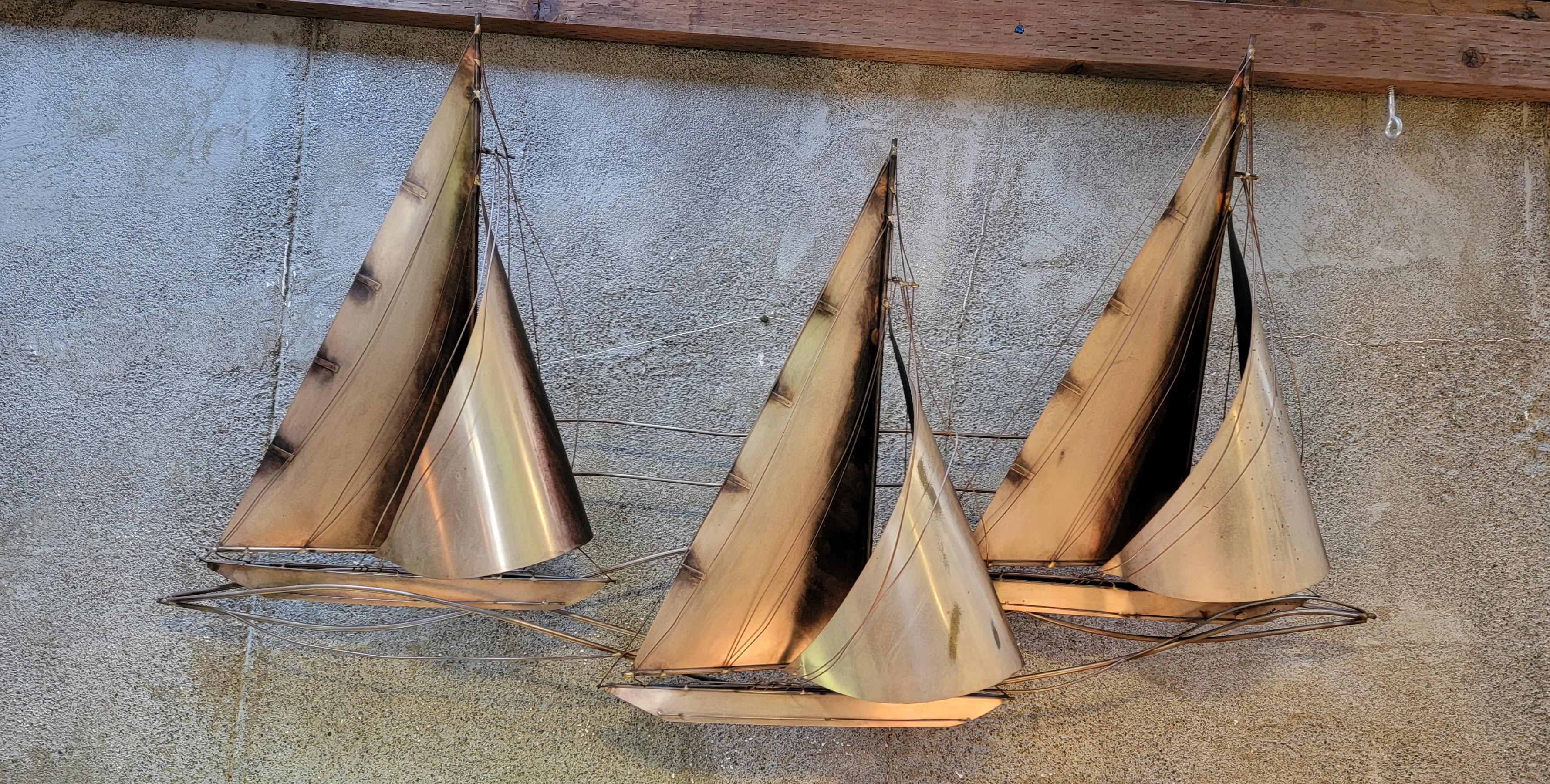 Large-scale copper and brass wall mounted sculpture by Curtis Jere. Nautical theme with 3 sailboats. Signed C. Jere and dated 1977. Measures 52 inched wide.