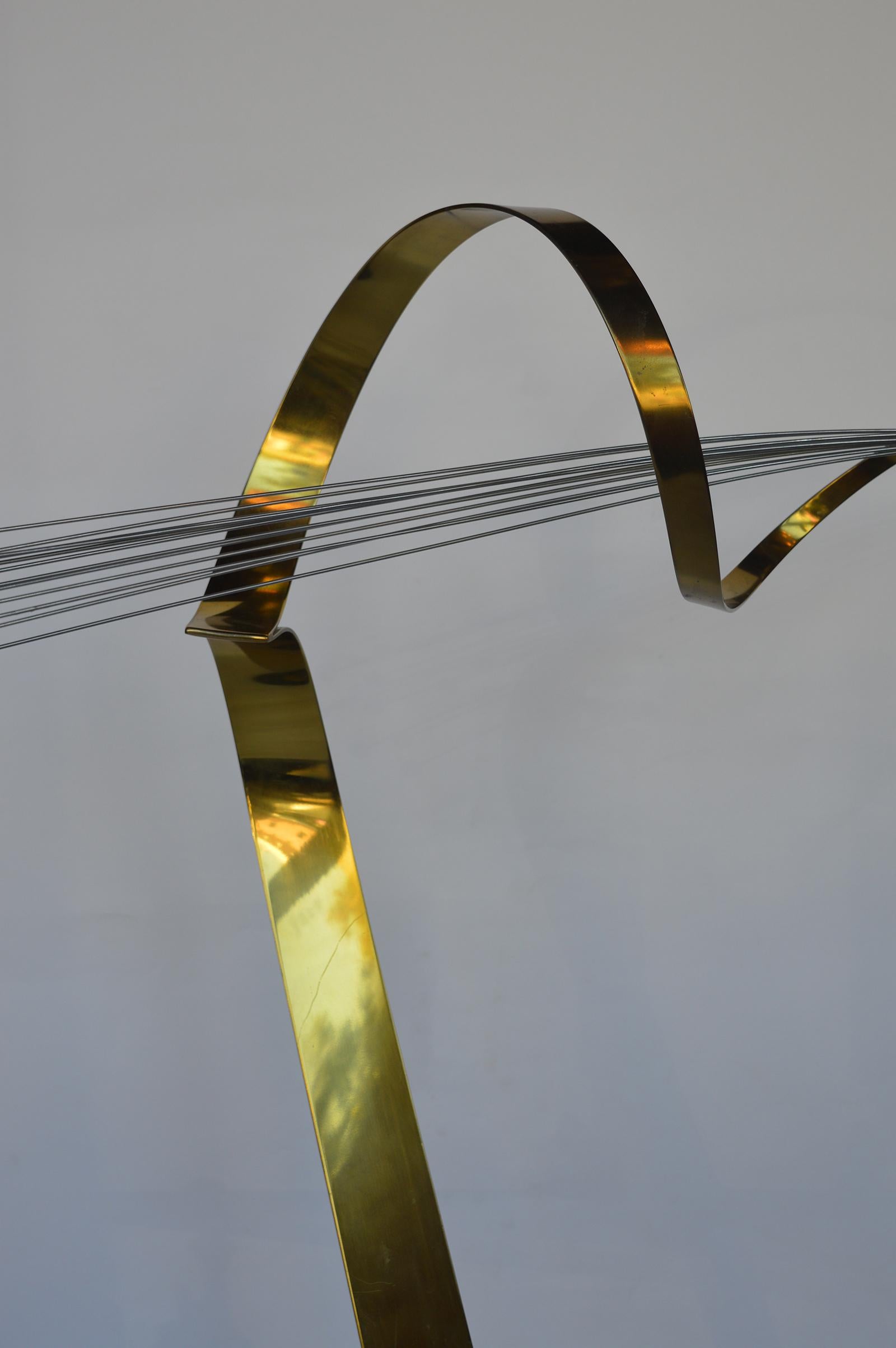 Abstract brass and chrome sculpture by Curtis Jere.