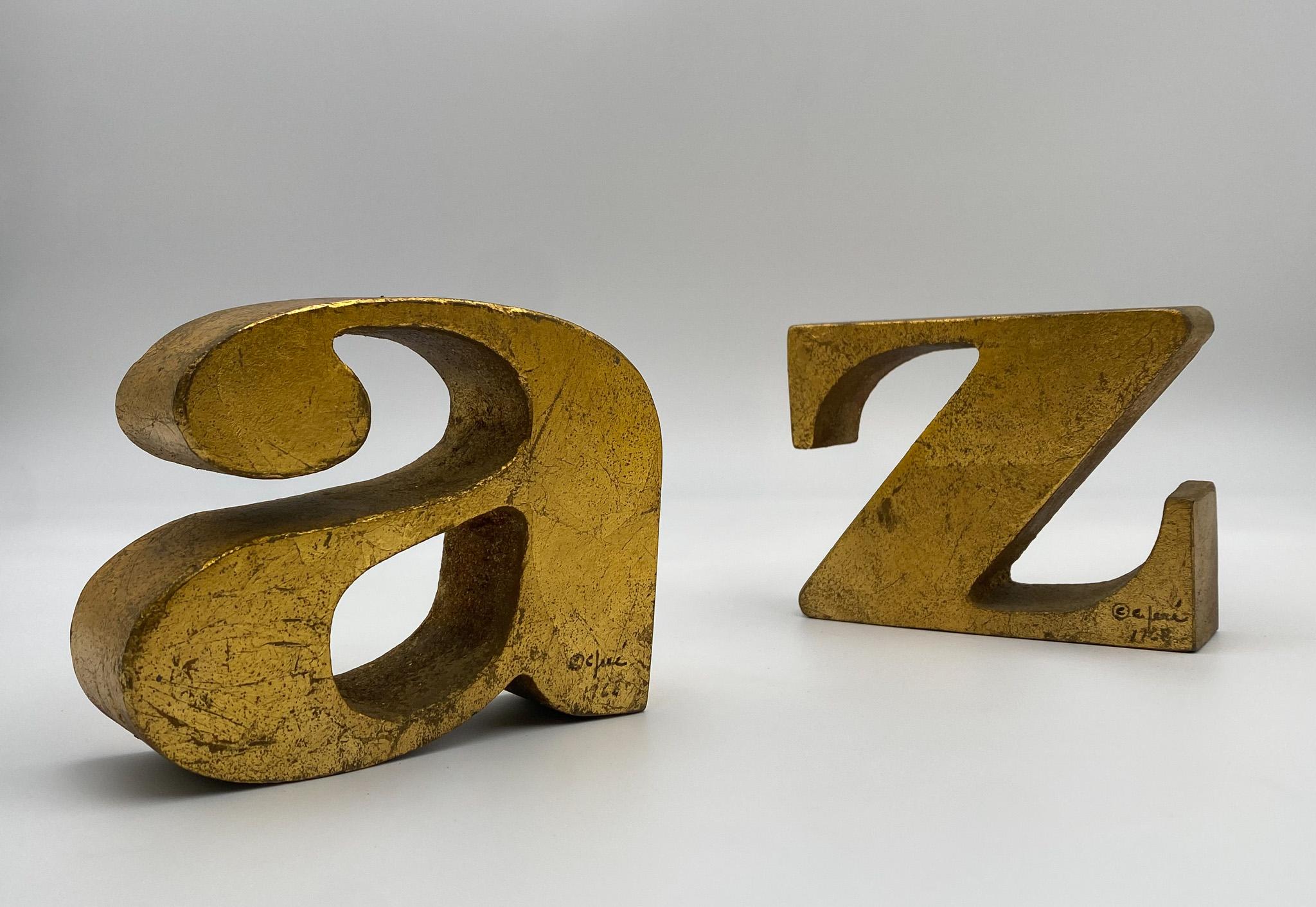 Curtis Jere Signed A to Z Heavy Gold Leaf over Iron Bookends, United States, 1960's. 